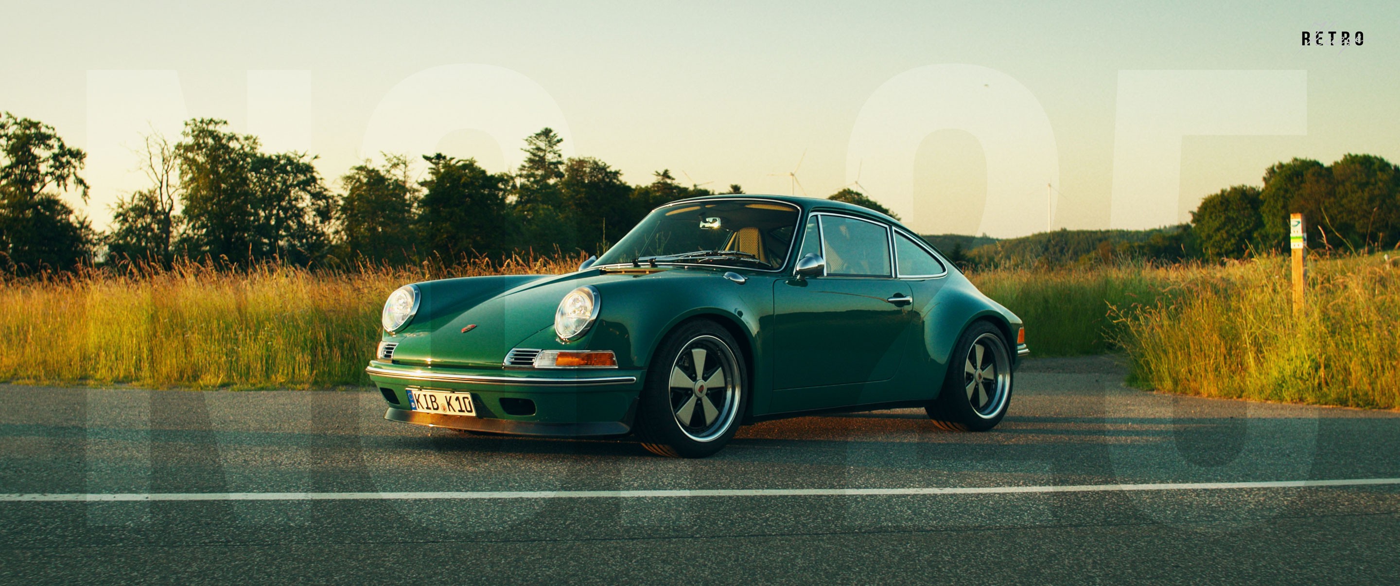 a green retro porsche