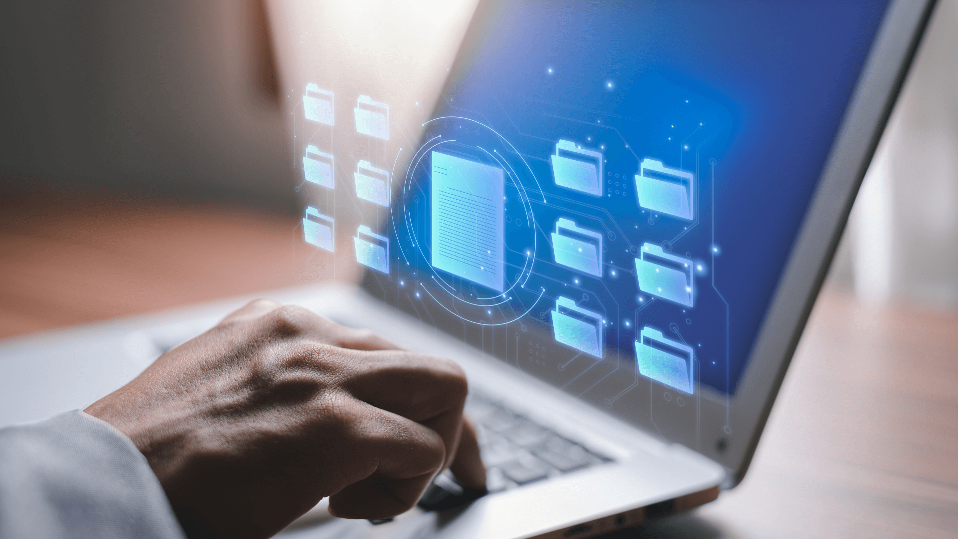 Digital files floating over open laptop - Automate Document Generation