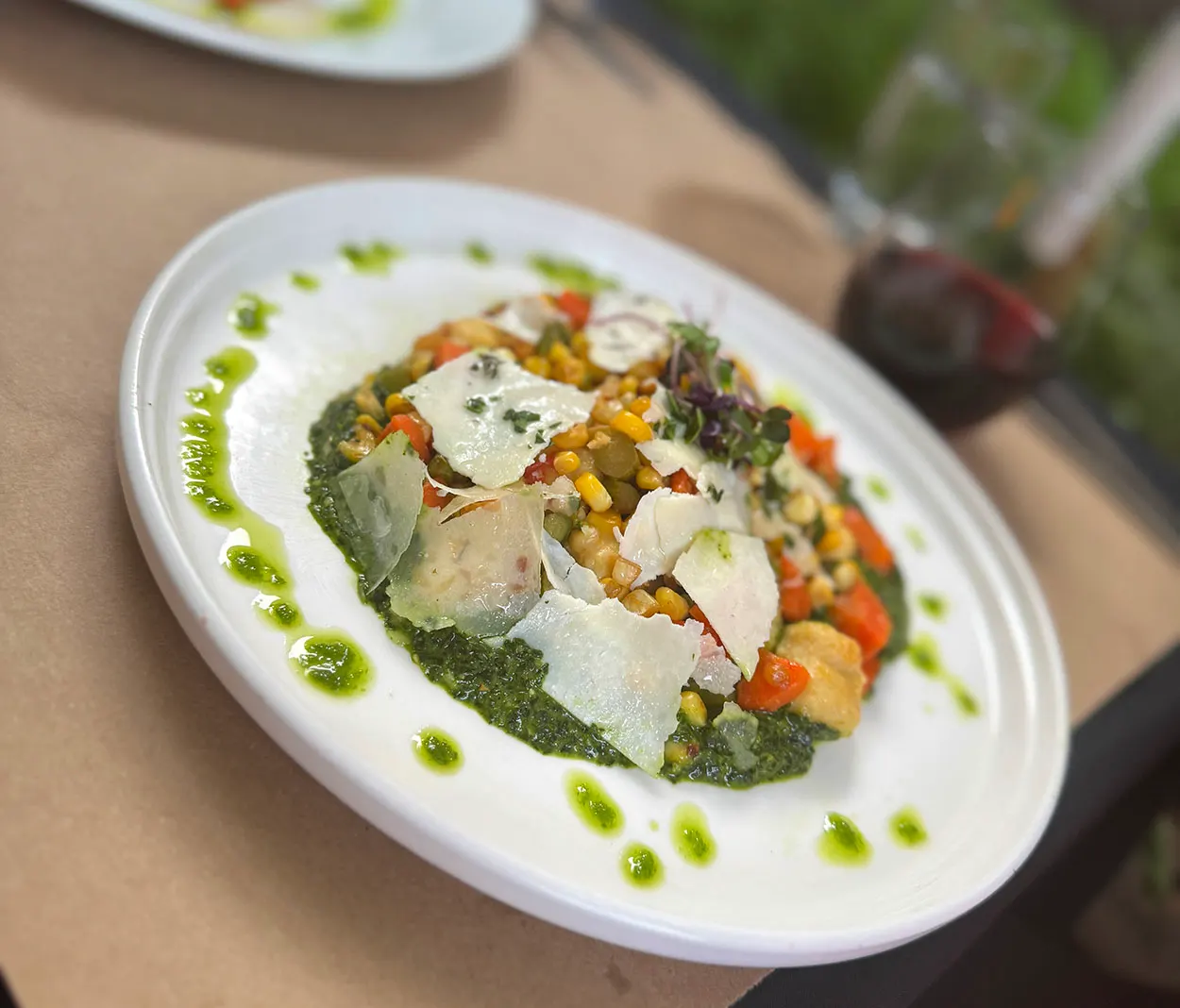 Baked ricotta gnocchi with pea pesto at Basi Italia