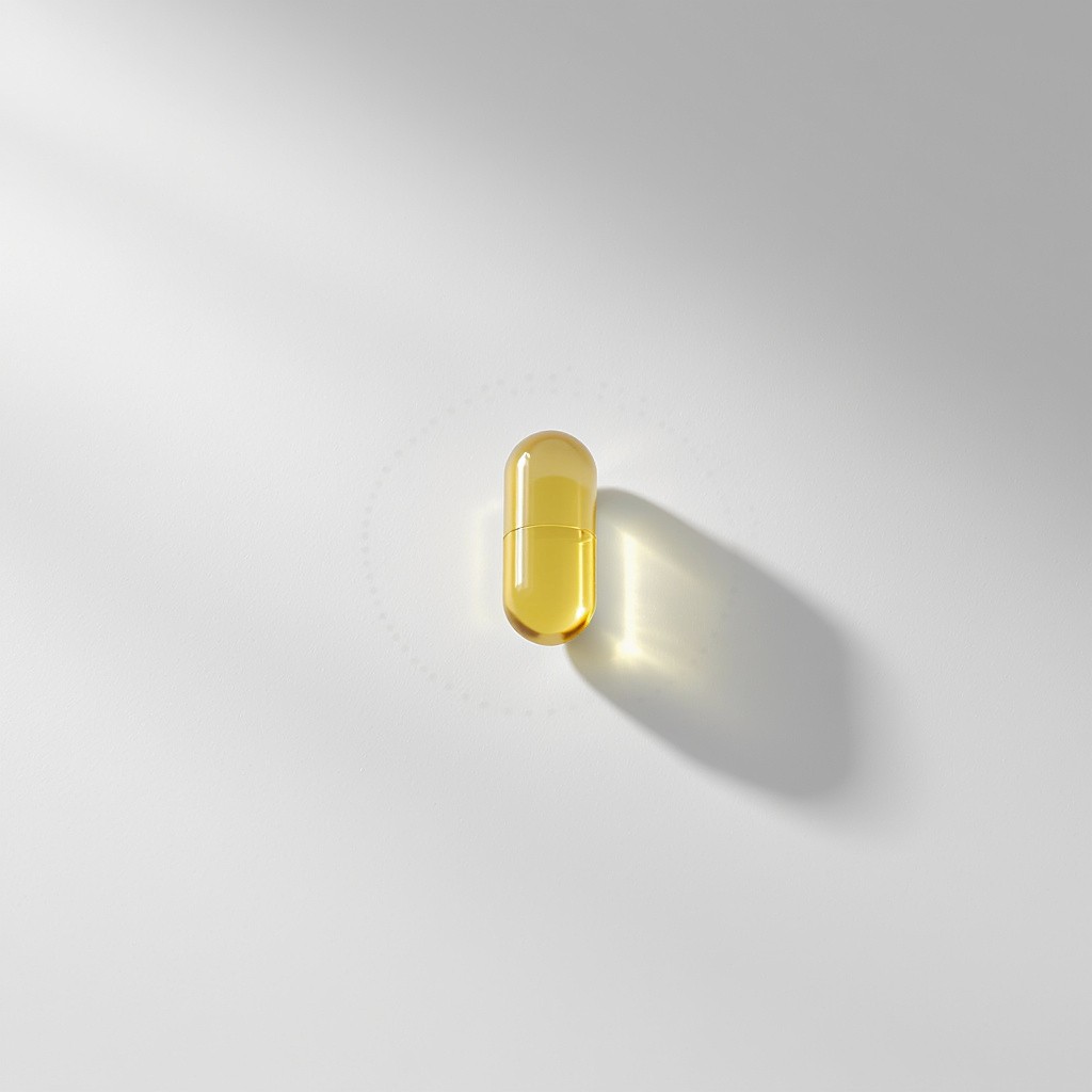 Laptop on a clean desk next to modern decor.