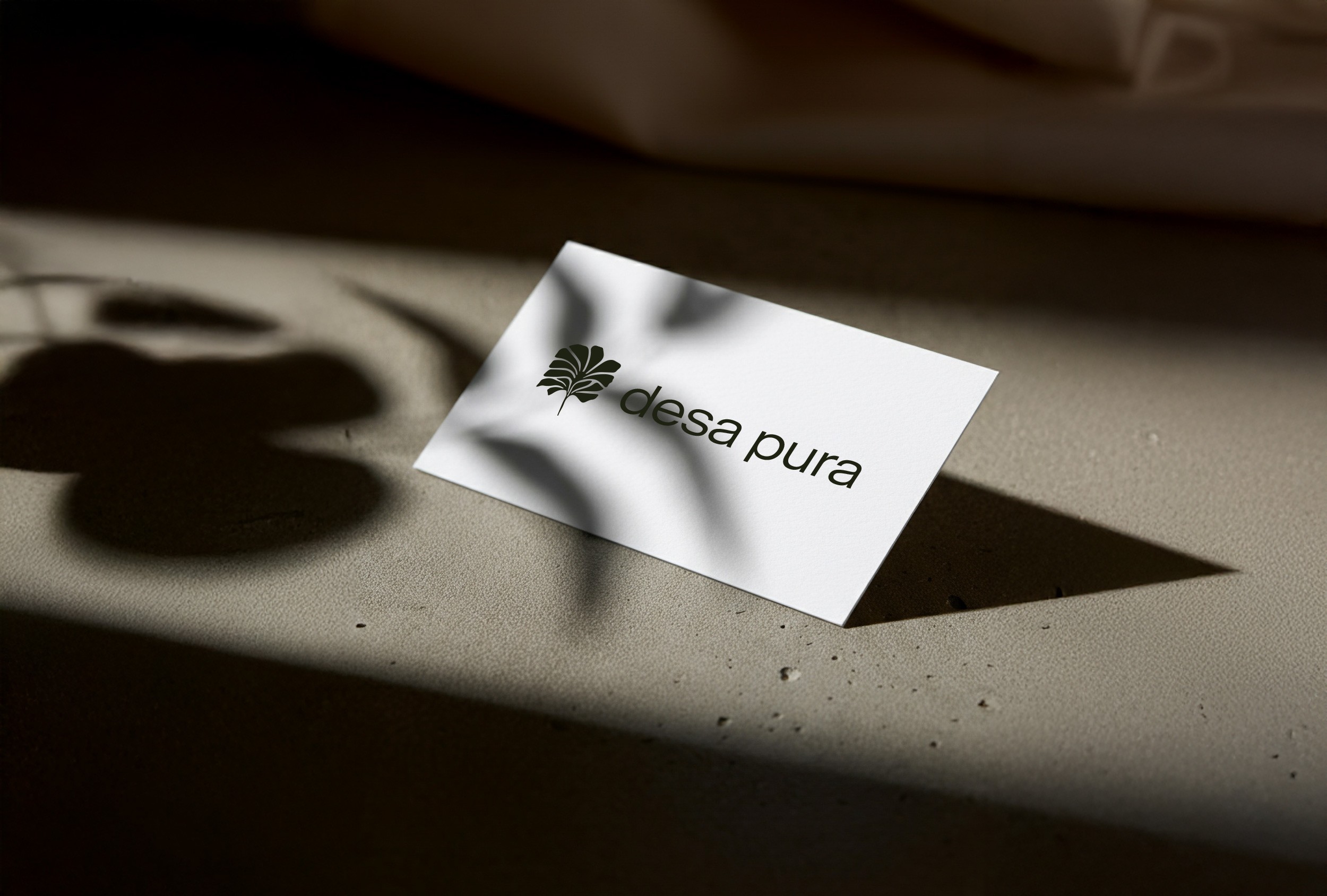 Logo des Desa Pura Wohnprojekts, das Natur, Gemeinschaft und modernes Wohnen symbolisiert.