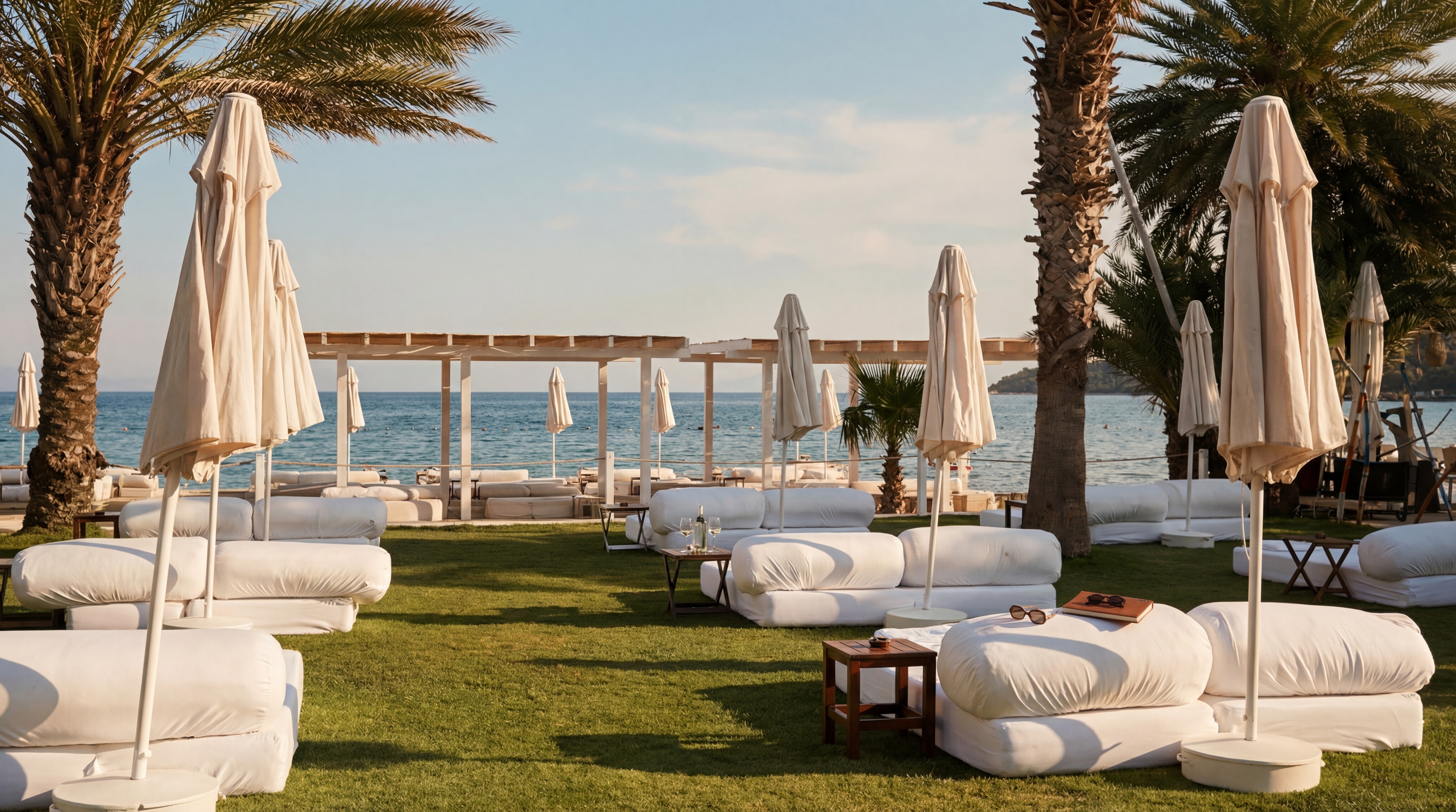 Flamm Bodrum beach club in Türkbükü with sun loungers, umbrellas, and relaxed beachfront setting