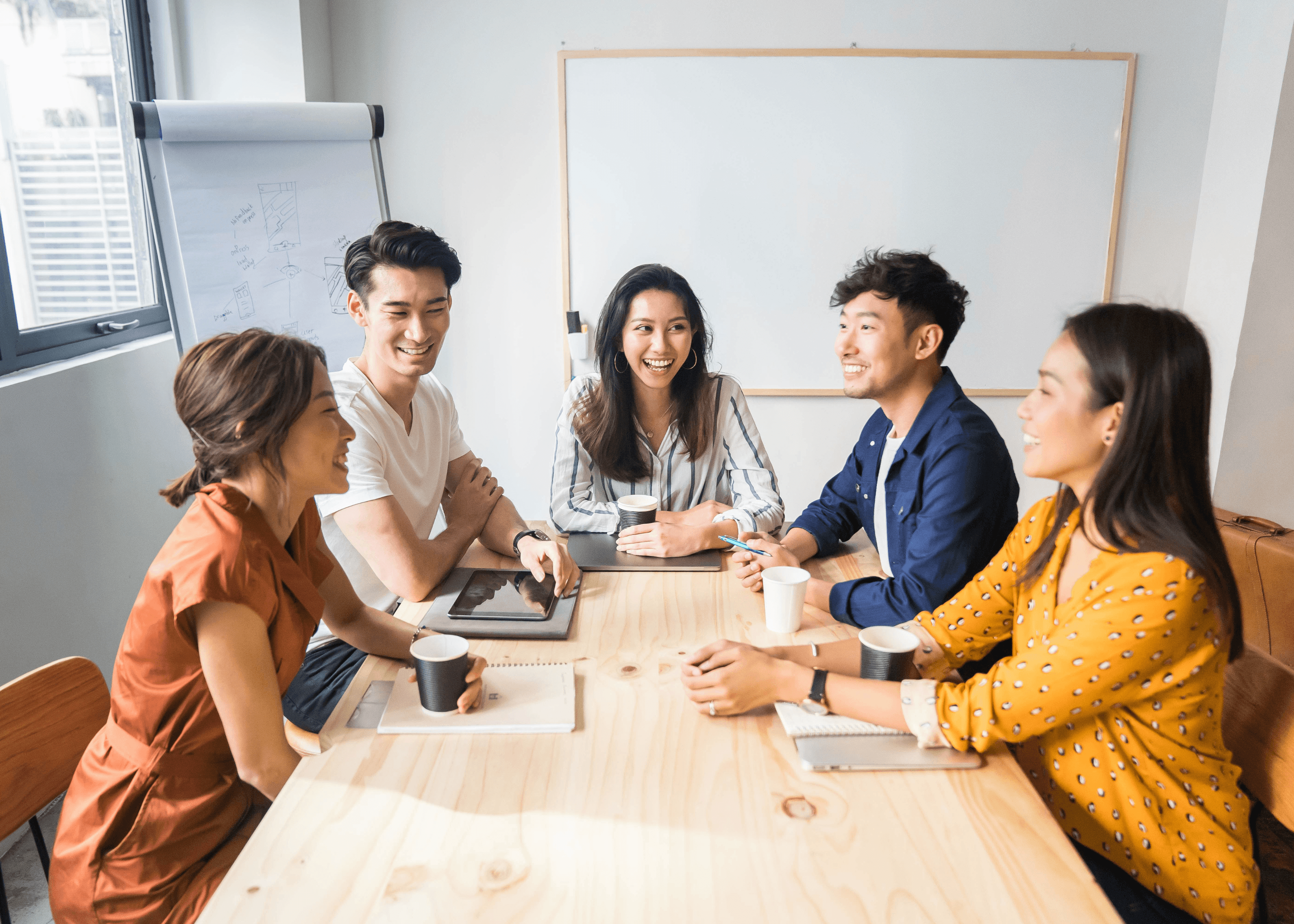 Group of people using laptop
