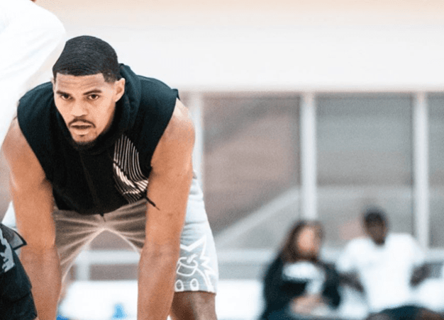 Photographer holding camera