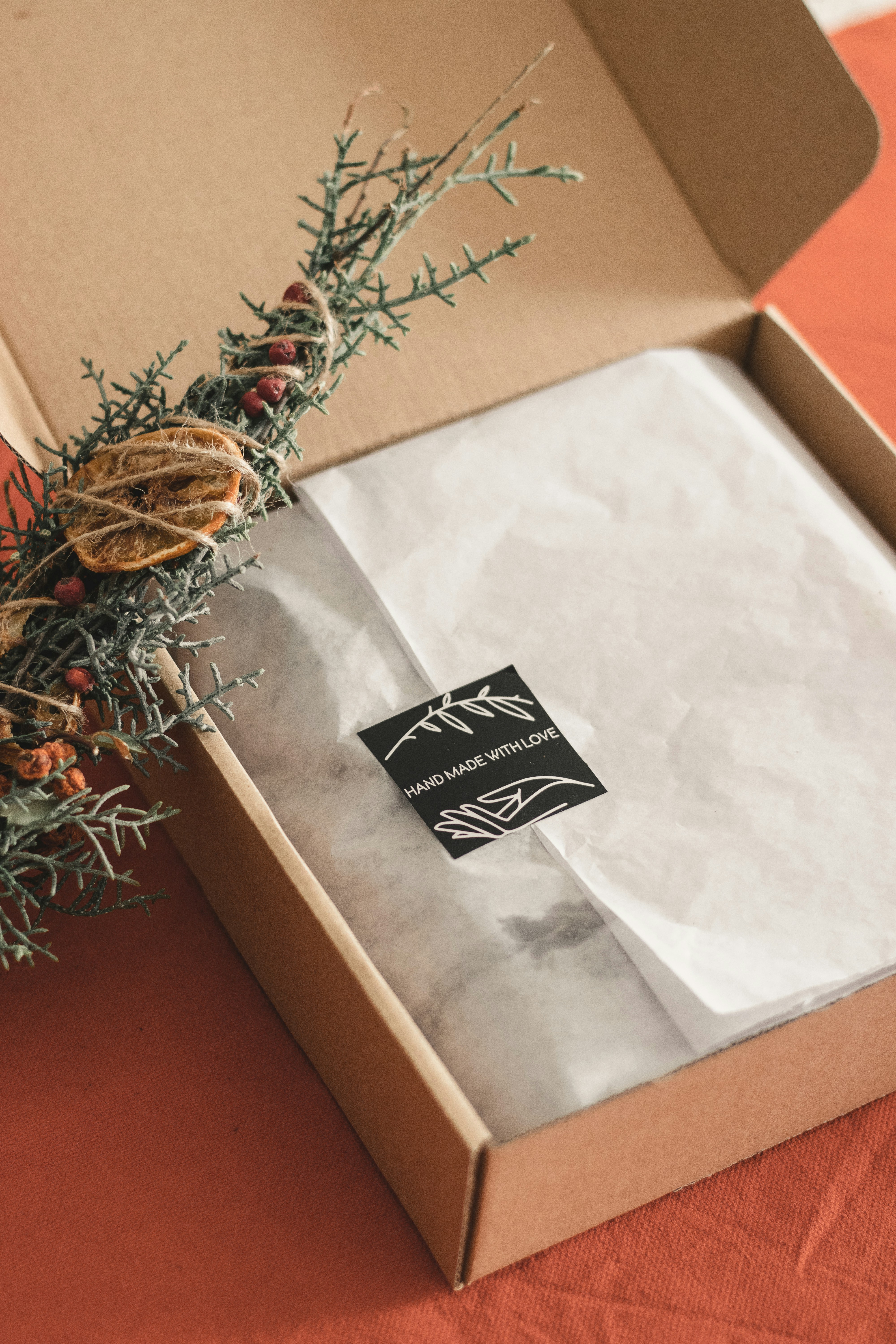 an open box with some dried fruit inside of it