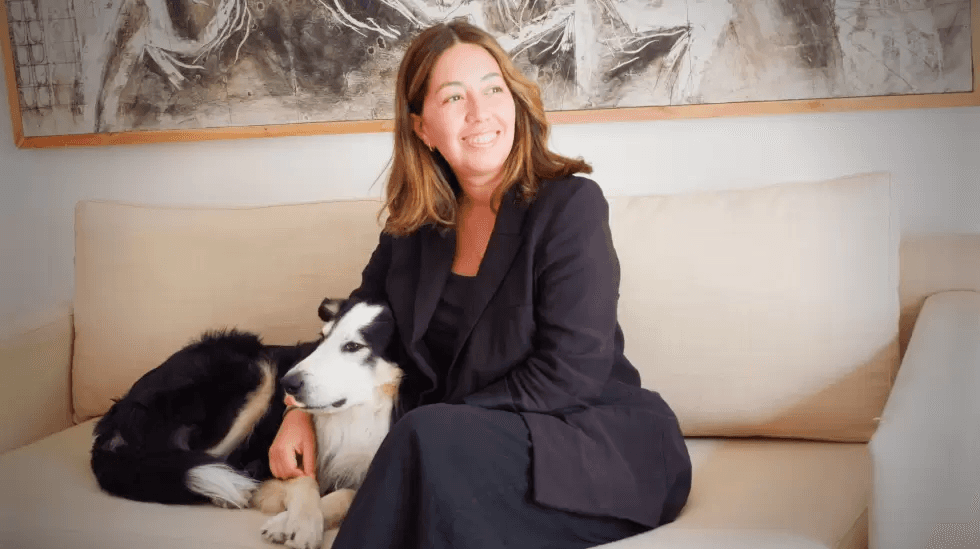 Keila Barral Masri alongside her dog.