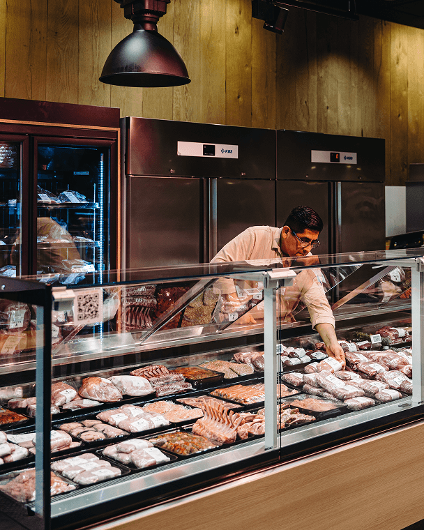 Image of Ashwagandha Root With a Product Bottle Behind