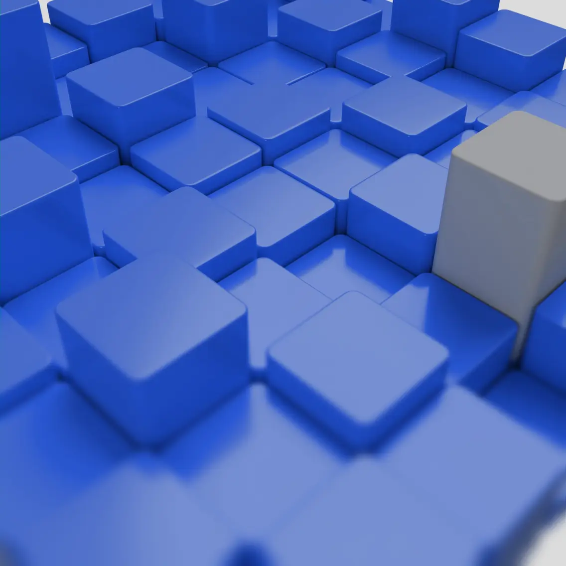 Abstract image featuring blue blocks with one gray block standing out from the surrounding blue blocks.