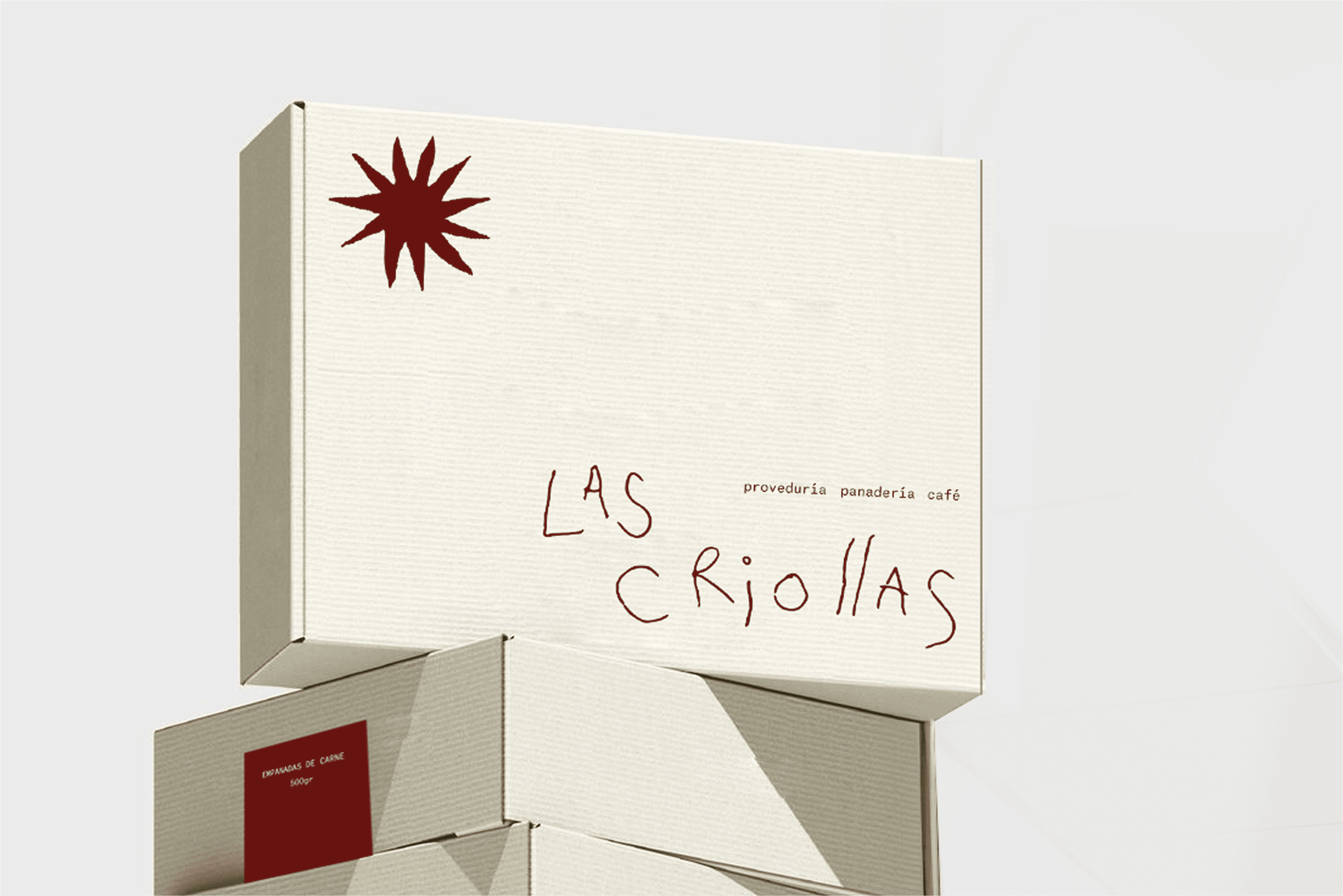 Chair with champagne and glasses by window.