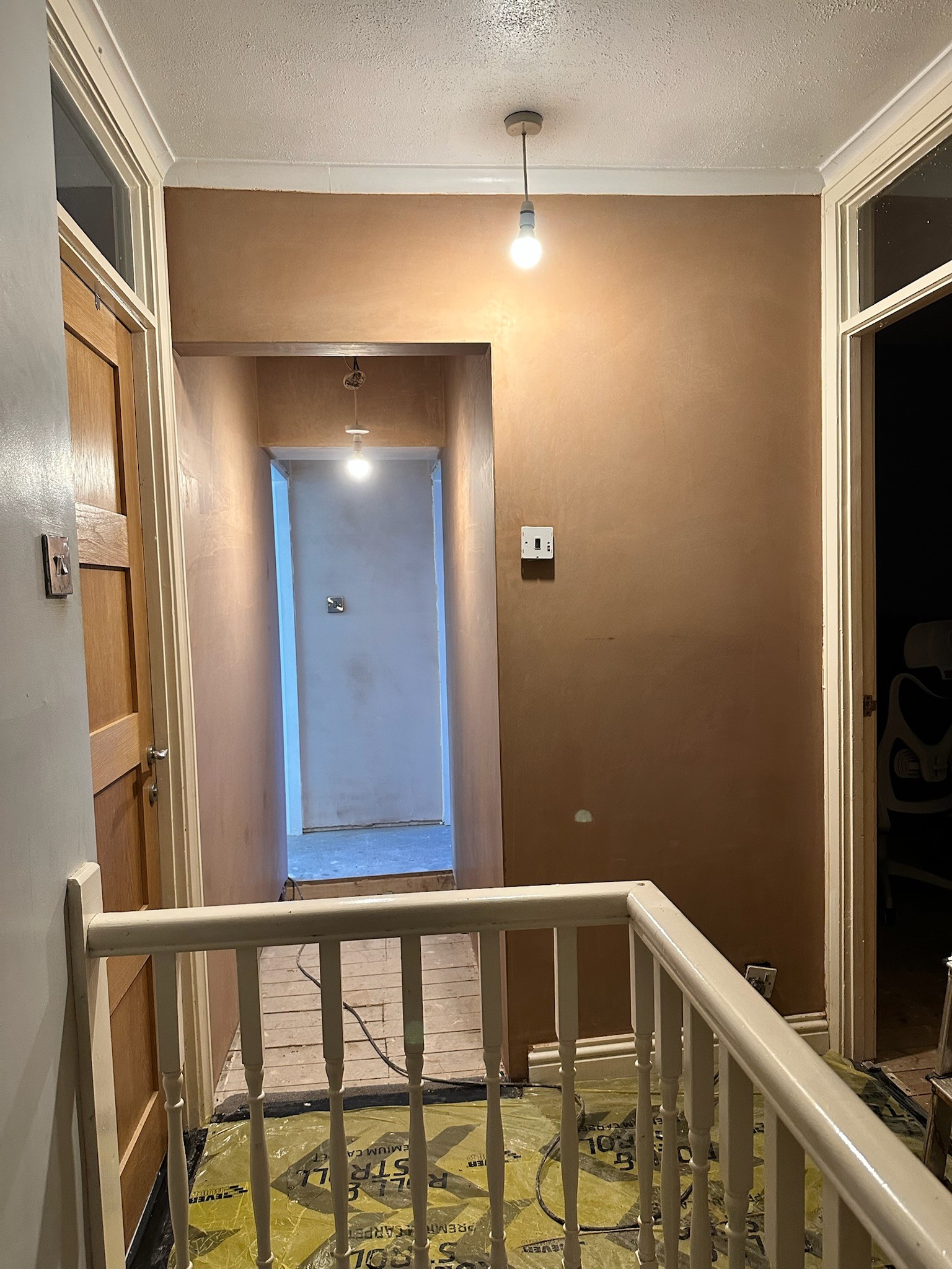 Freshly plastered doorway and landing.