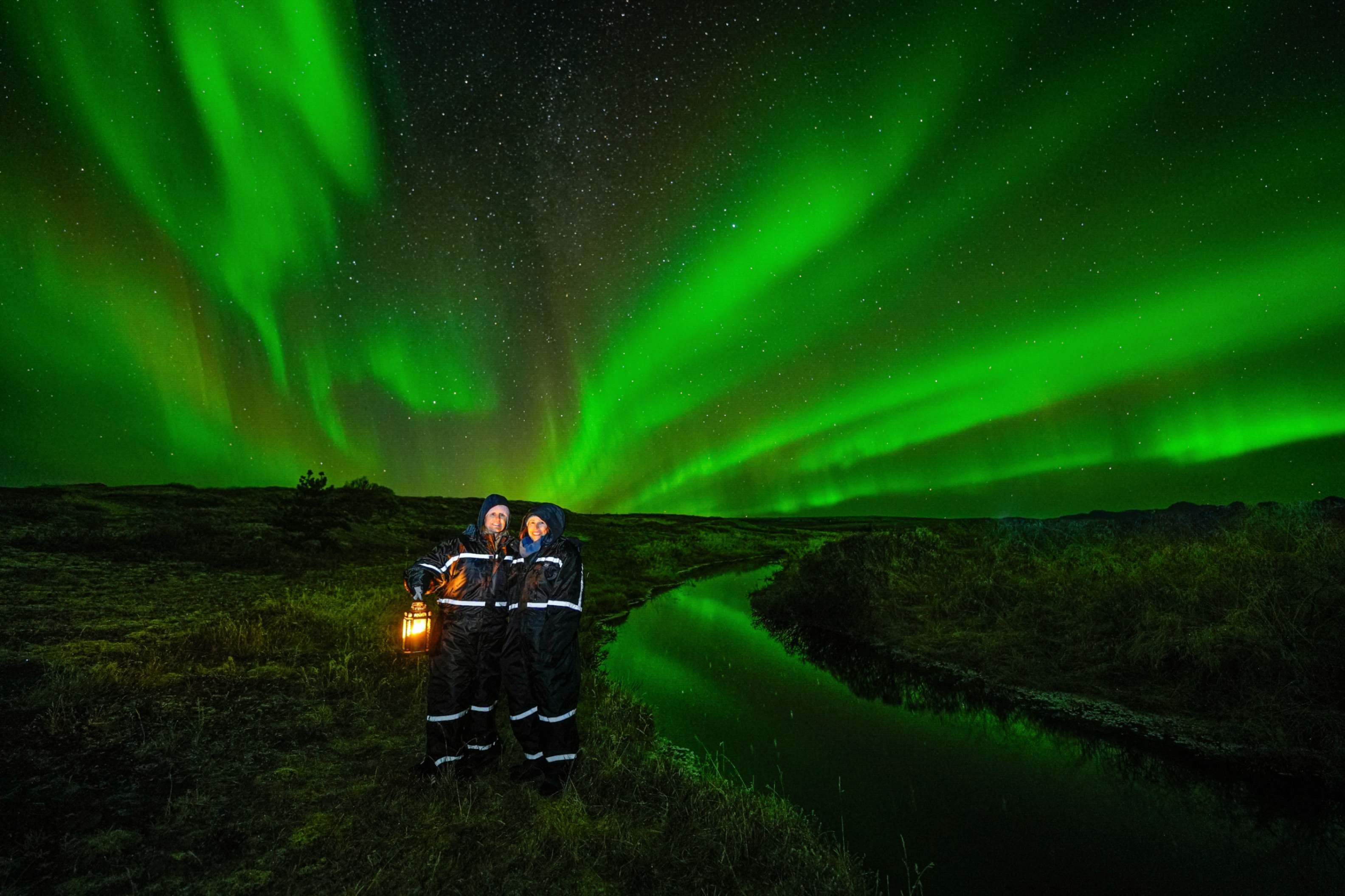 Northern Lights tour photography from Aurora Experts in Iceland, featuring guests beneath the aurora, winter landscapes, and vivid skies over remote Icelandic locations.