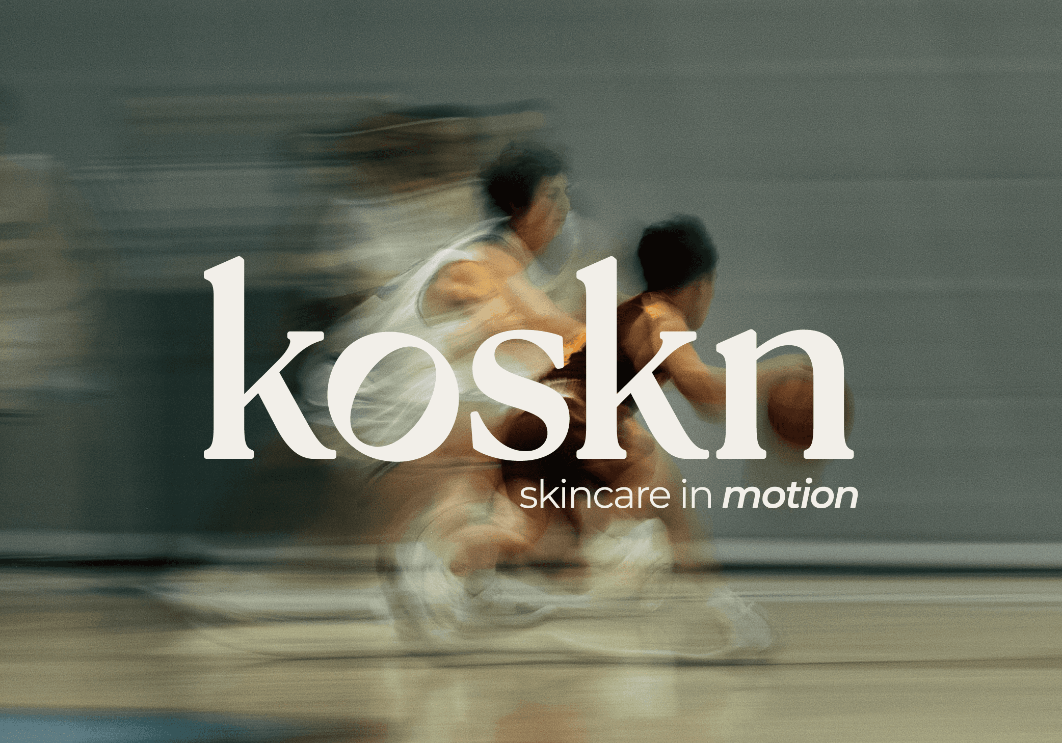 Core koskn logo on top of a photograph of player playing basketball with a blurred effect