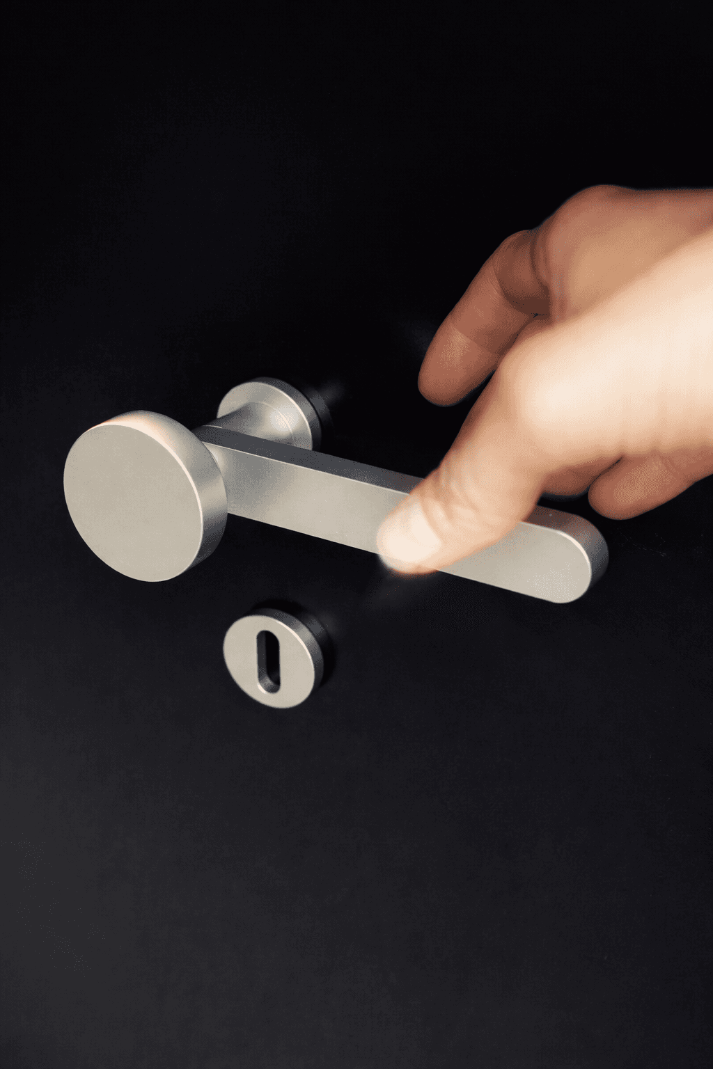 woman holding a phone and man looking at the phone. both are smiling