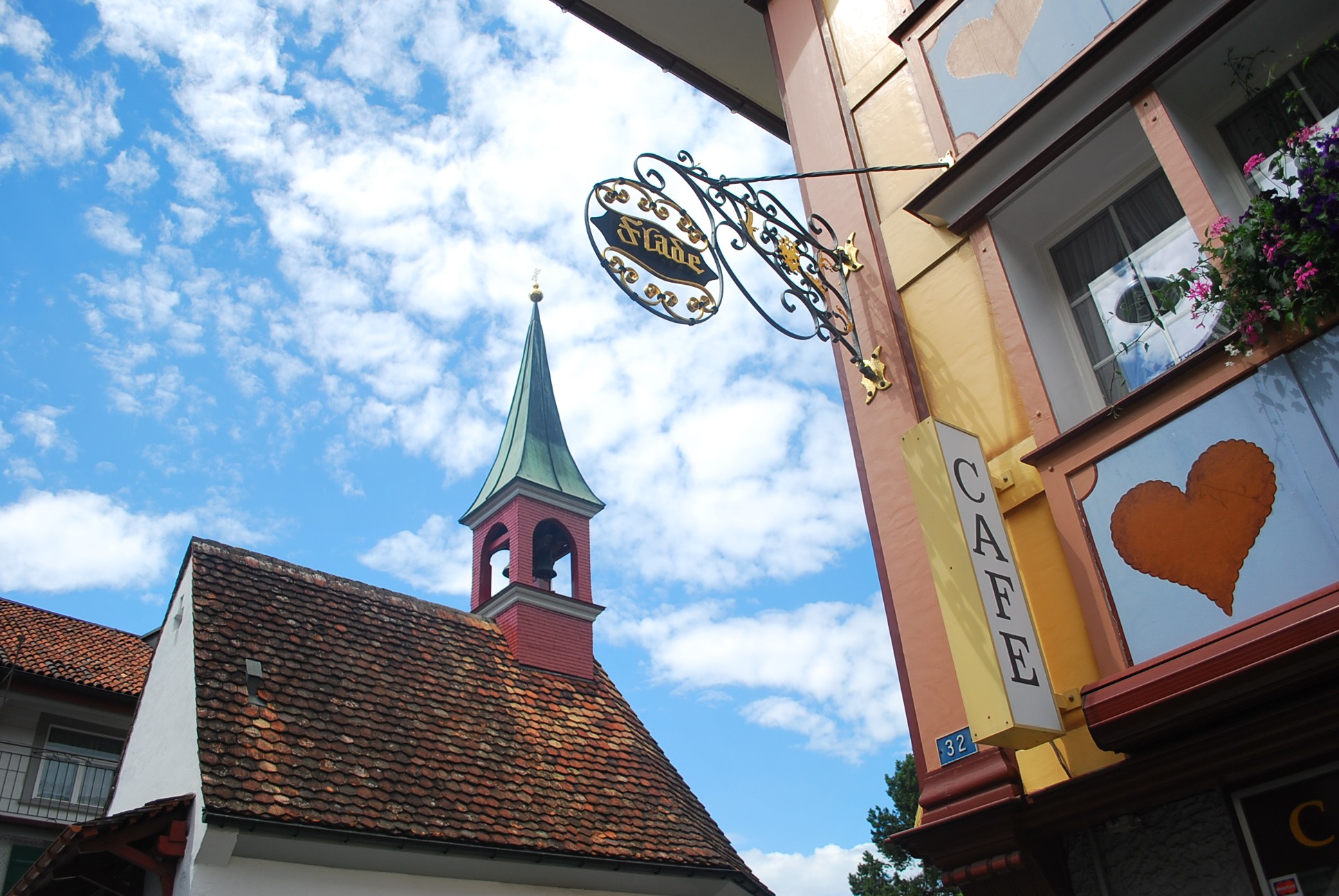 brown wooden beach lounge chair on beach during daytime