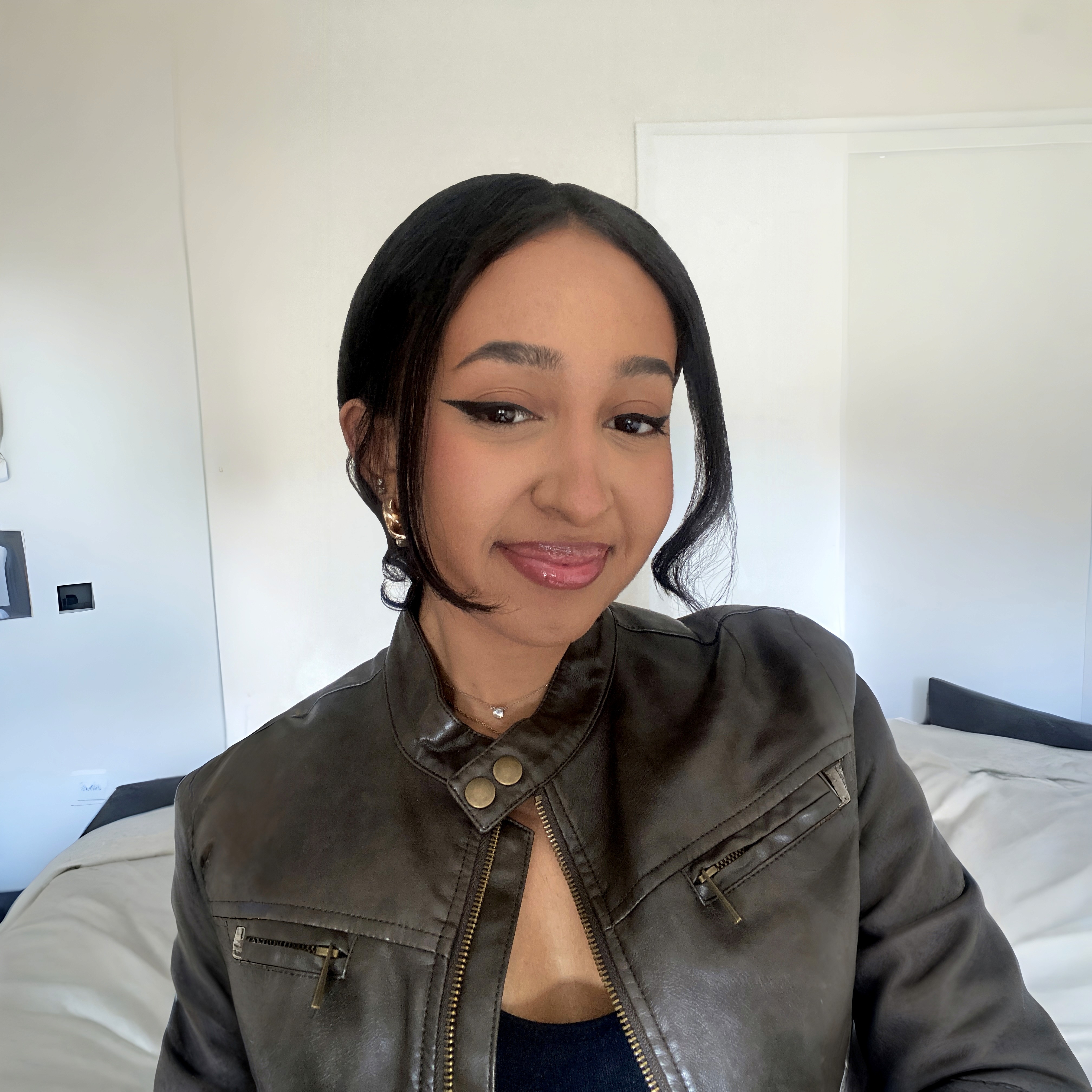 Headshot of *Designer Name*