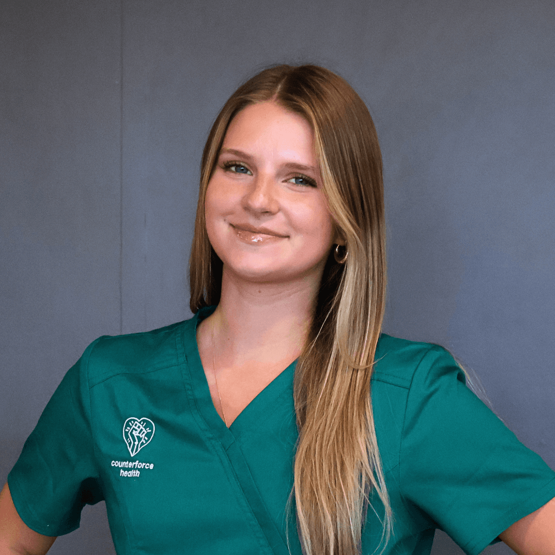 Brinley in Counterforce scrubs
