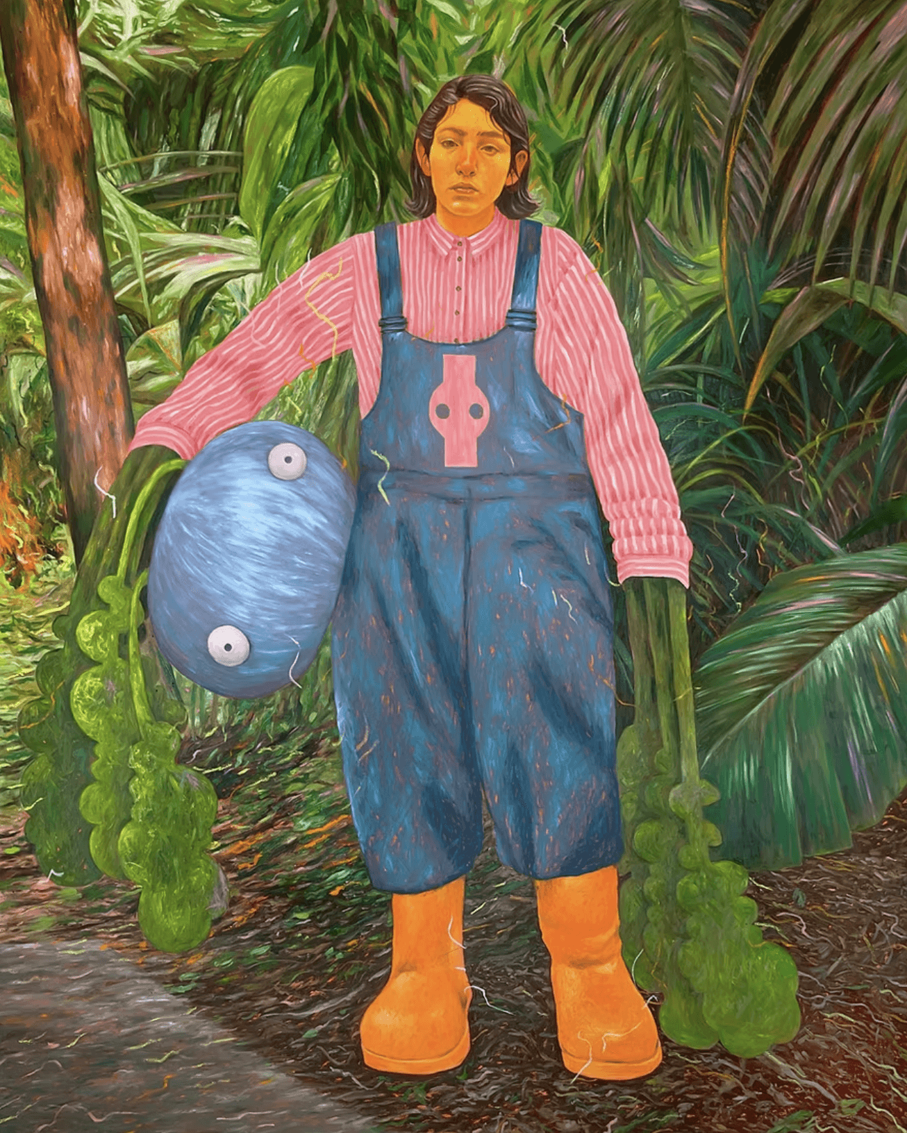 Young woman in colorful robe reads a book.