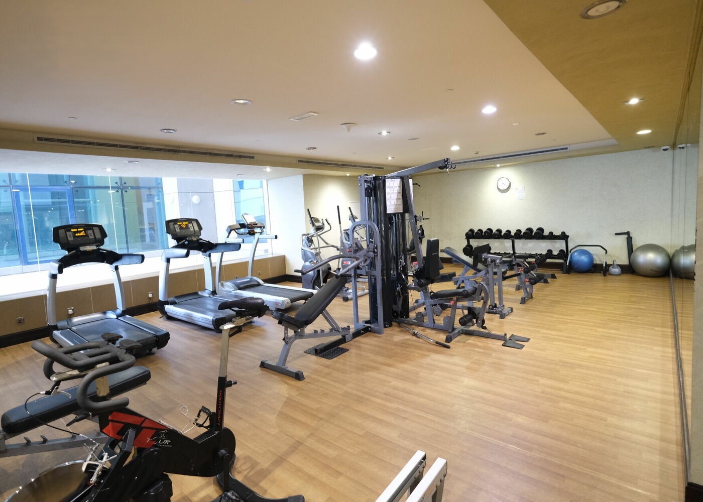 Modern entrance and gold signage of Latifa Tower for office and residential use.