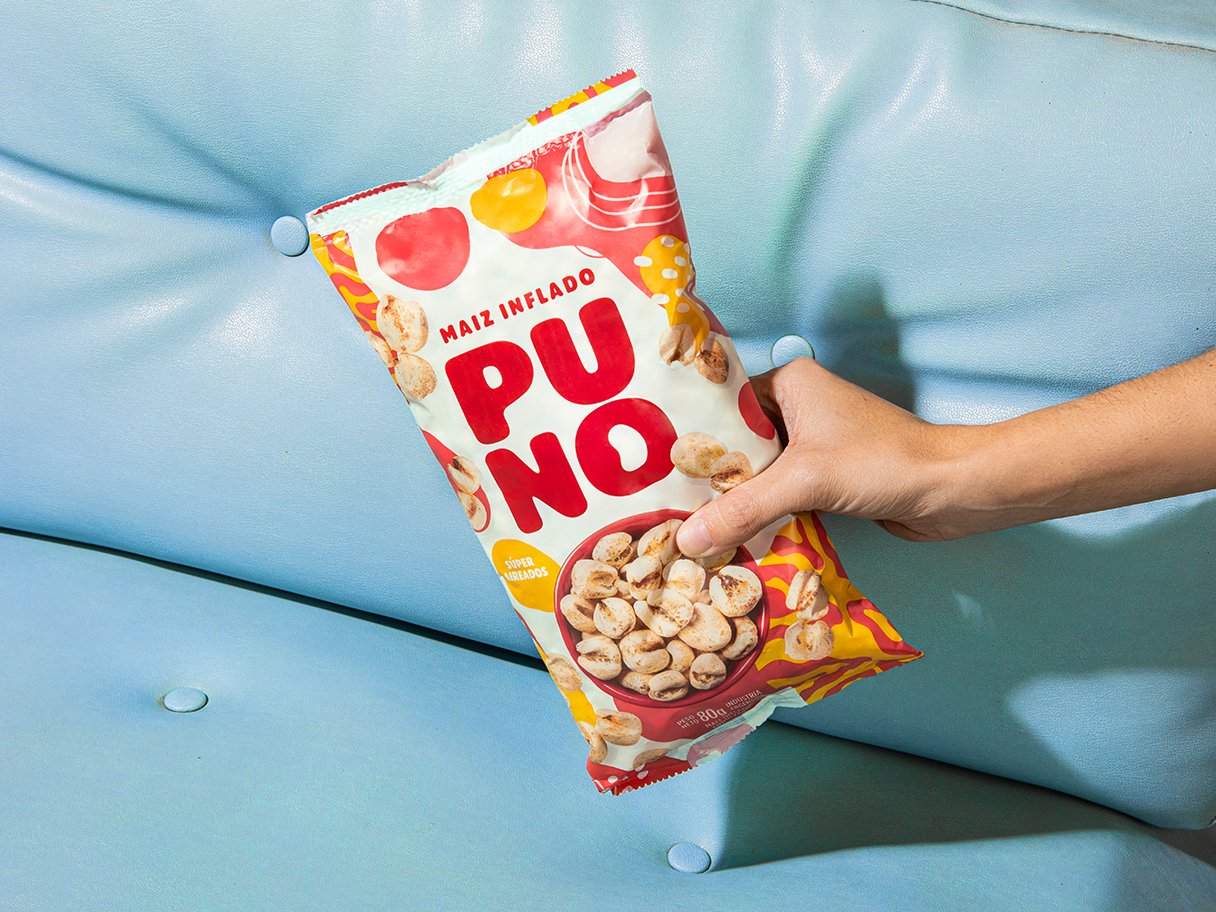 Rustic cabin in a golden field at sunset