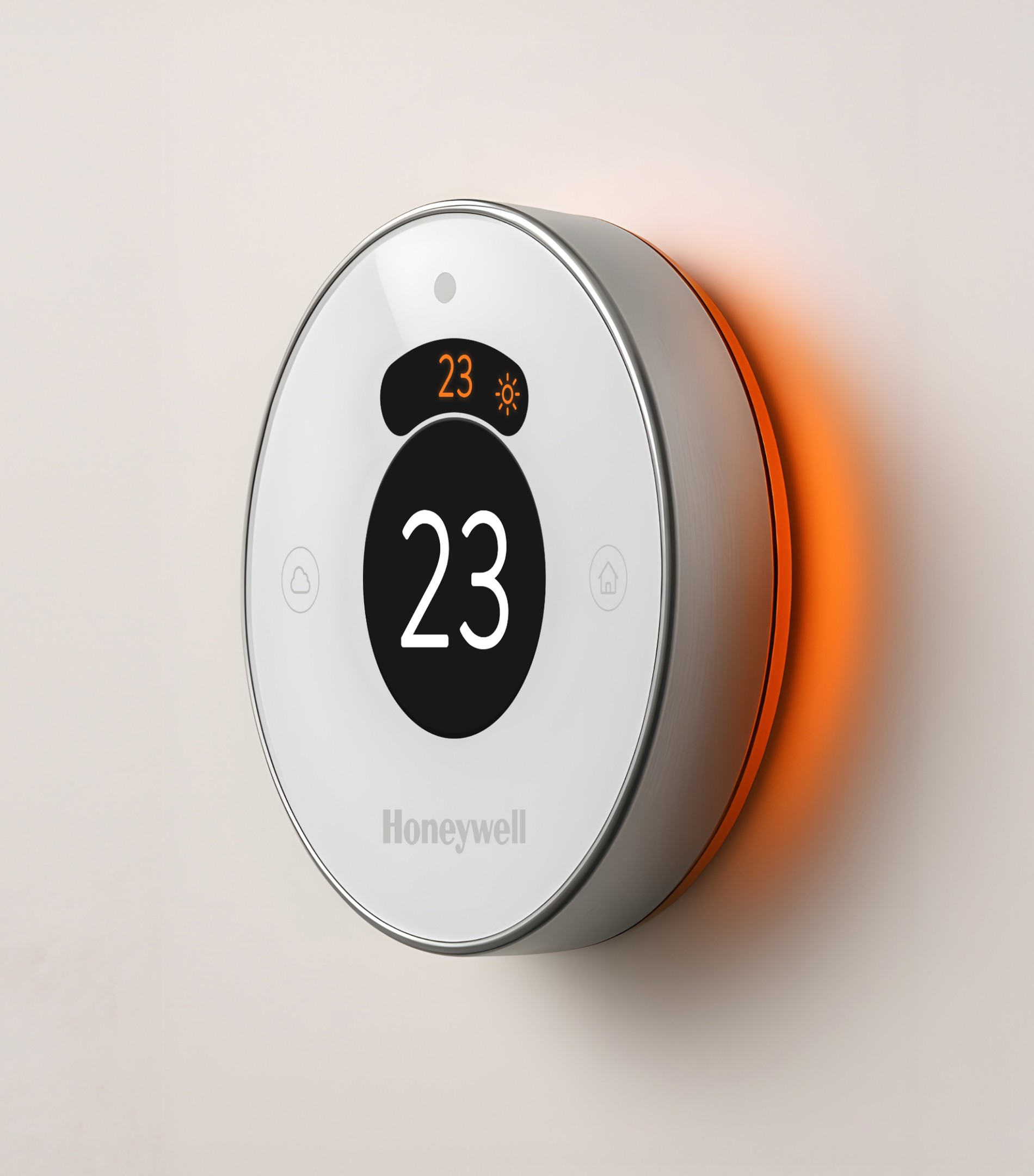 Close-up of Honeywell smart thermostat mounted on wall showing temperature set to 23°C