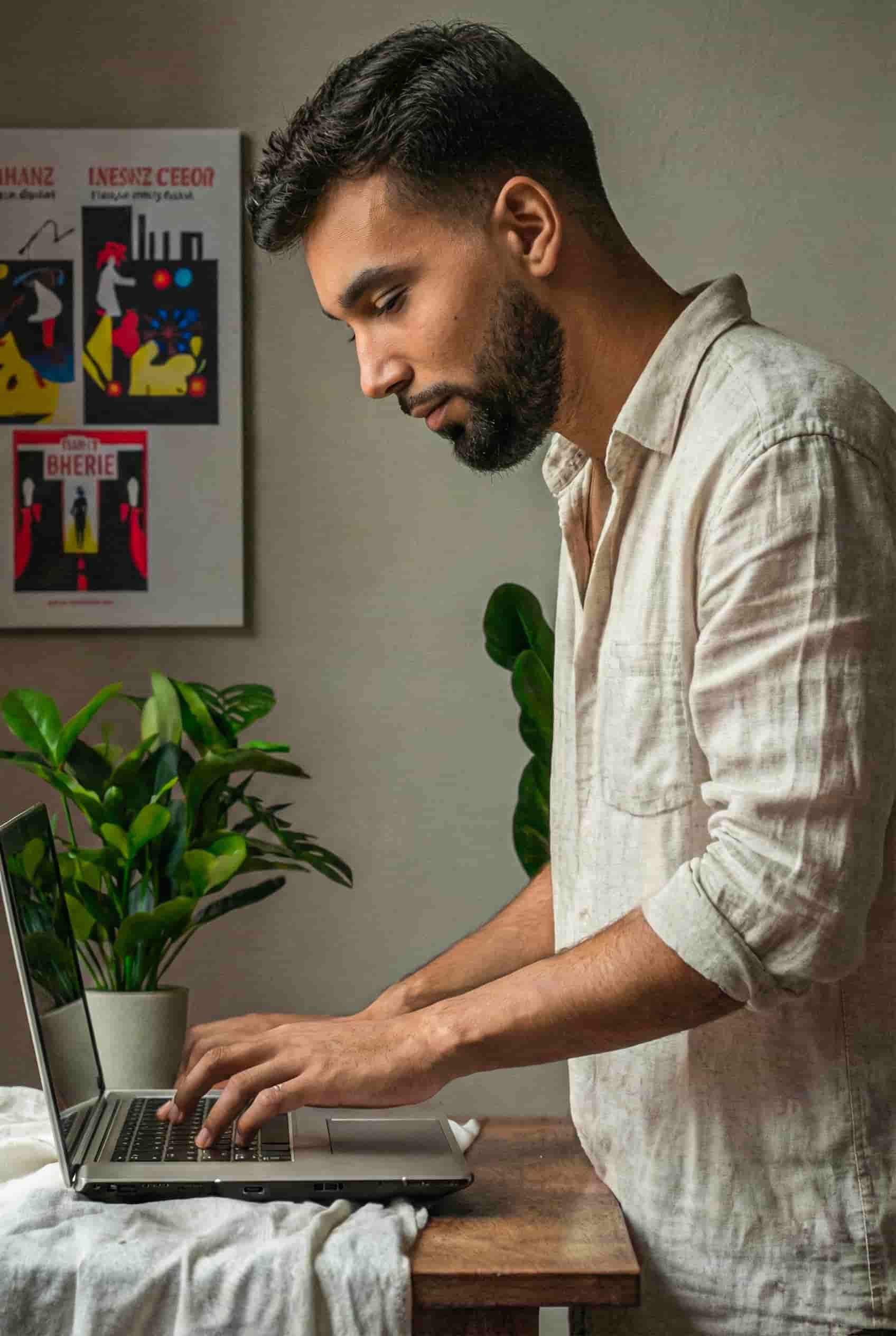 brown wooden lounger near body of water