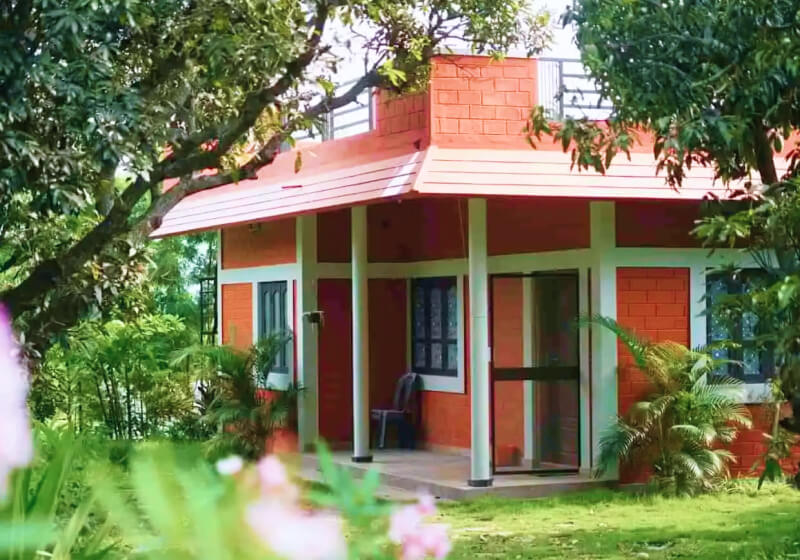 A flower-filled ring floats in fluffy clouds.