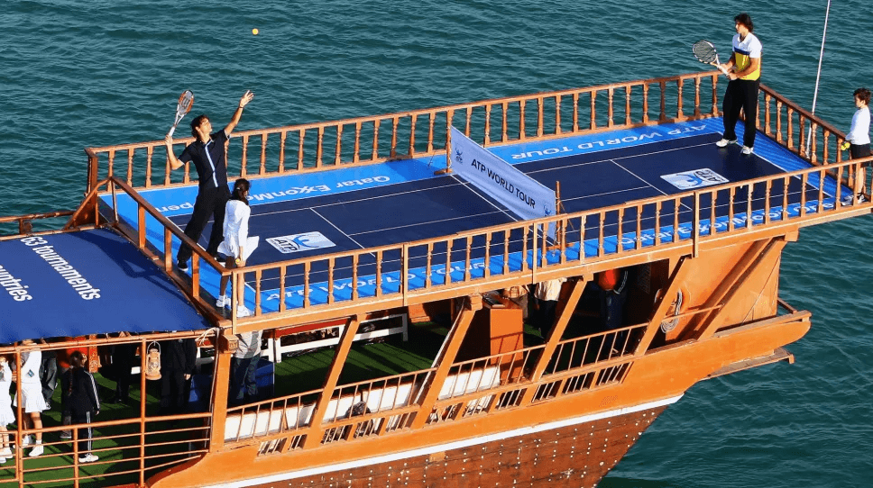 ATP players Novak Djokovic, Carlos Alacraz, Grigor Dmitrov, Stefanos Tsitsipas play doubles on camels before the Qatar ExxonMobil Open in late February (above. Several years before, Roger and Rafa played on the country’s popular Dhow boats.