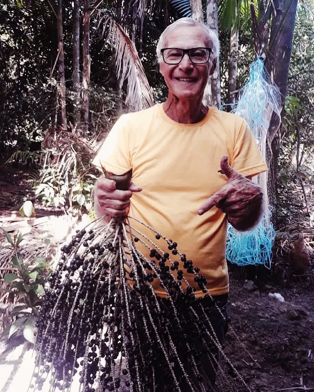 Marci's father holding acai
