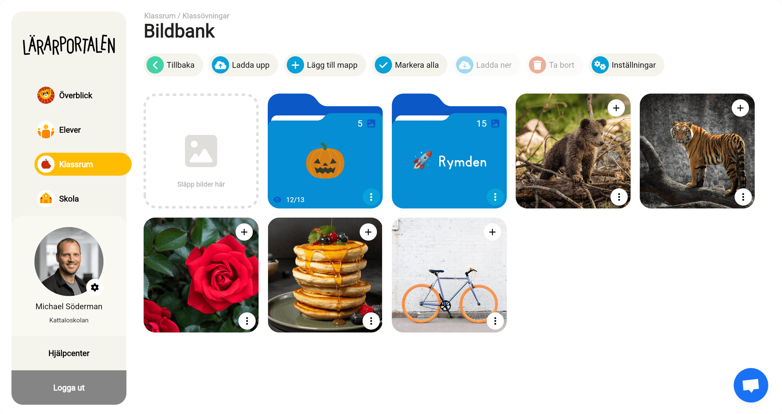 Bildbanken i Lärarportalen med mapparna Halloween och Rymden samt uppladdade bilder på djur, en ros, pannkakor och en cykel
