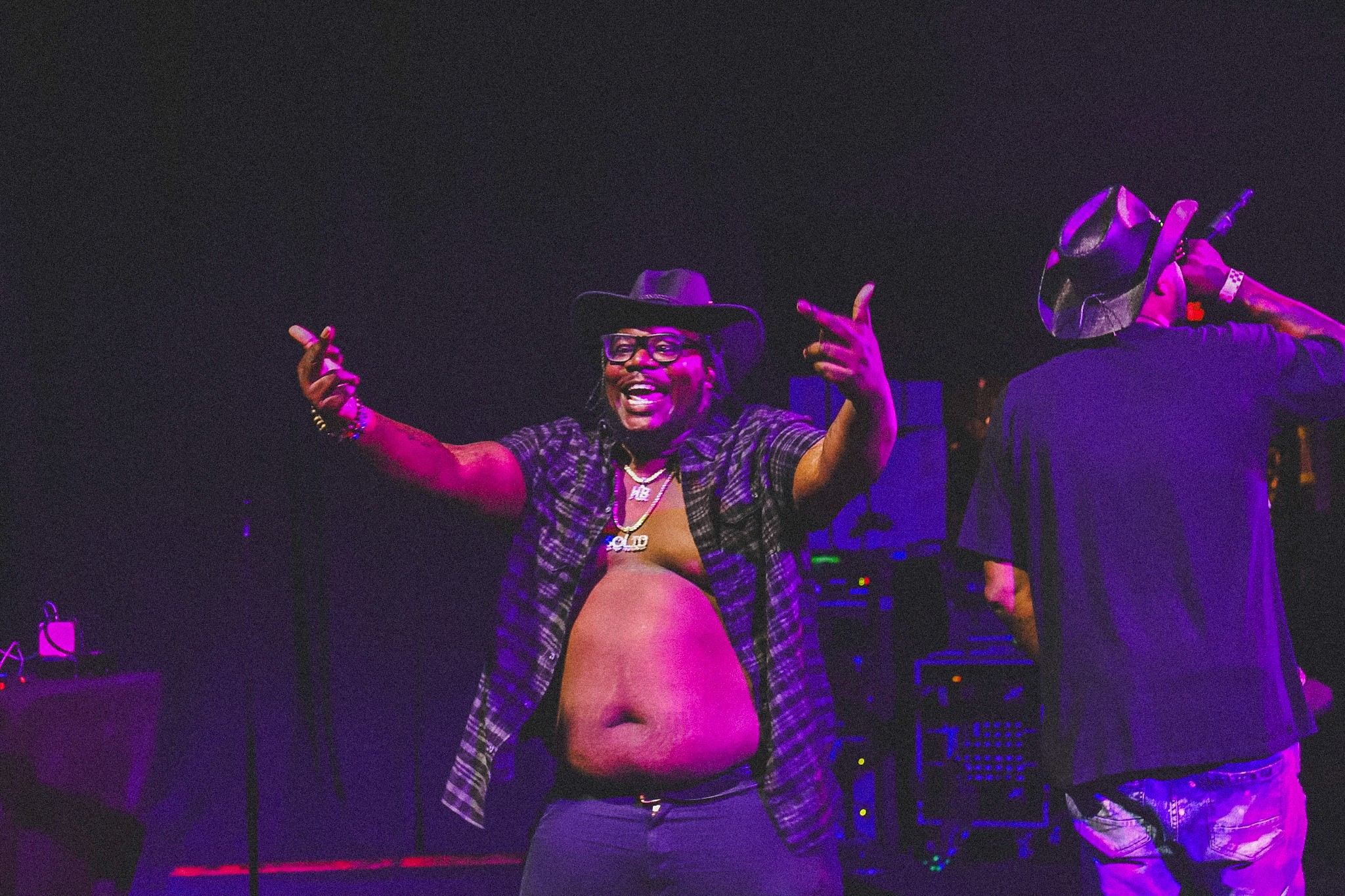 image of a man and a woman sitting on a sofa with a skin face mask
