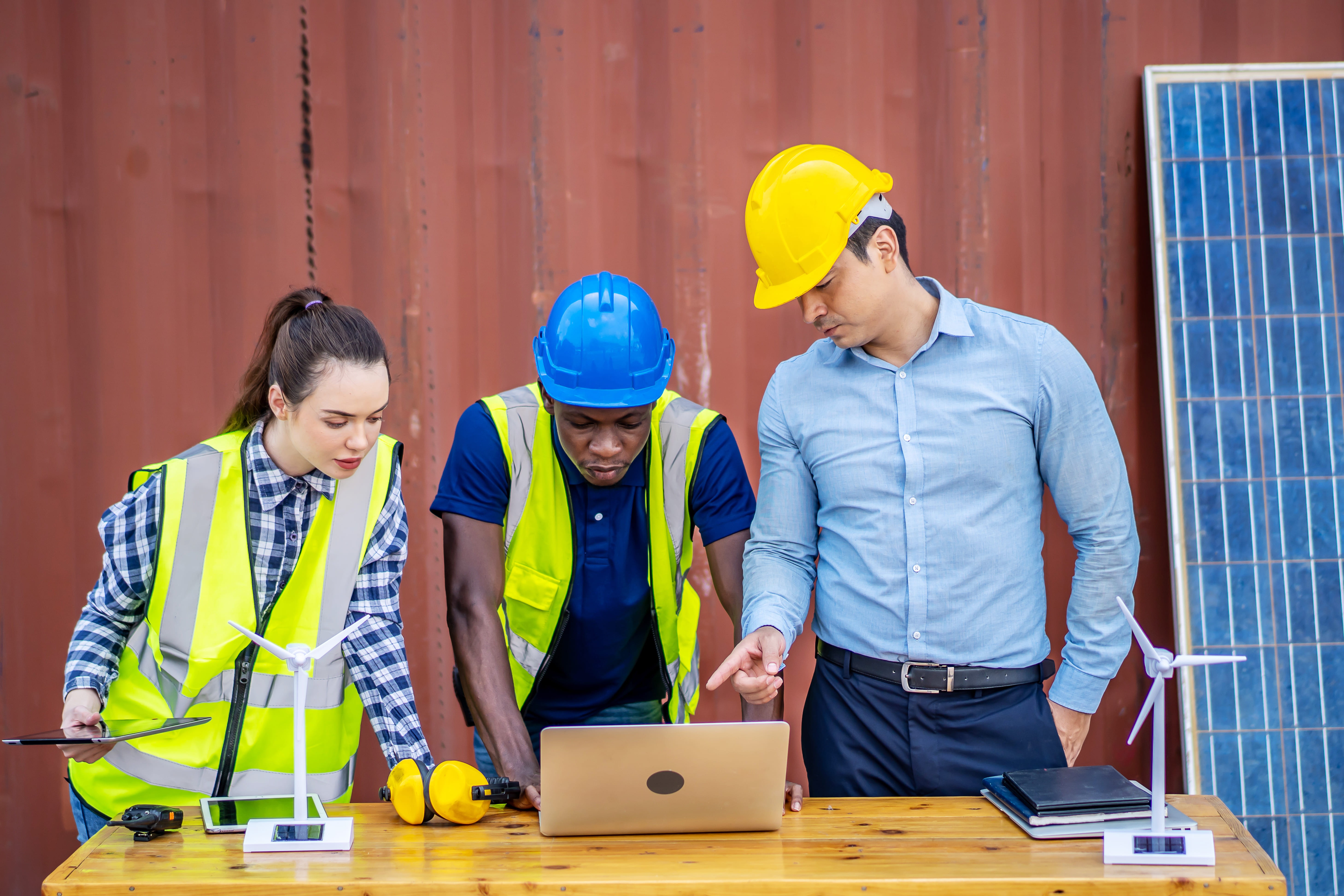 people-at-construction-site-with-solar-panels