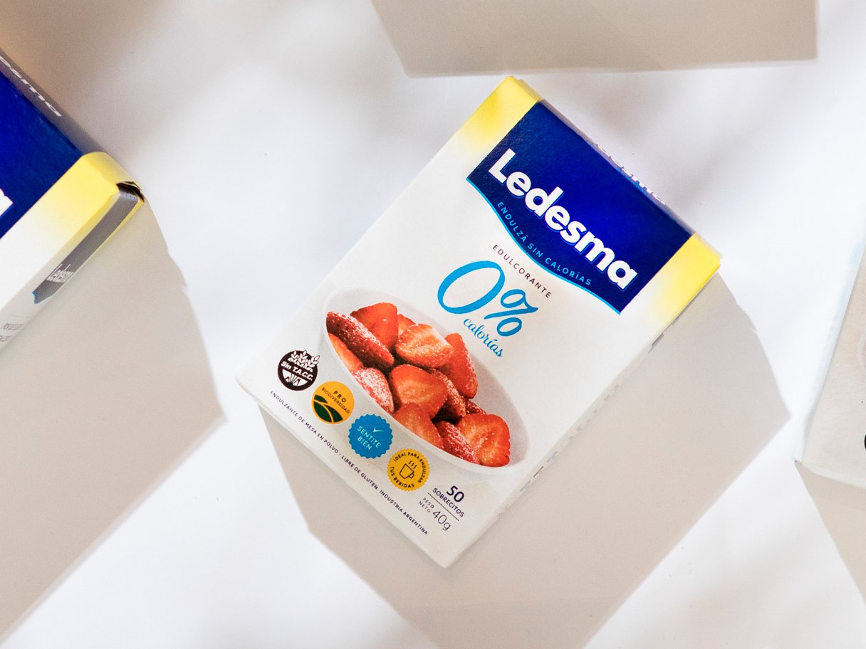 Rooftops of a coastal town with the sea in background