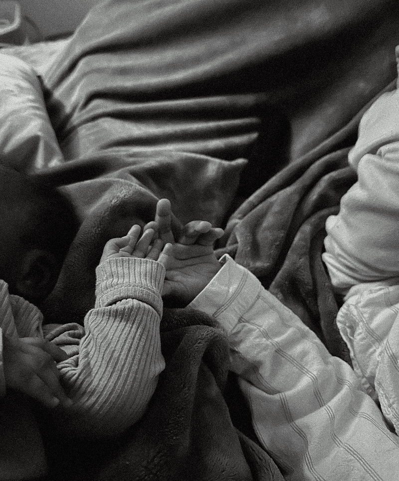 Boardroom meeting with city skyline in the background, representing commercial contracting services.