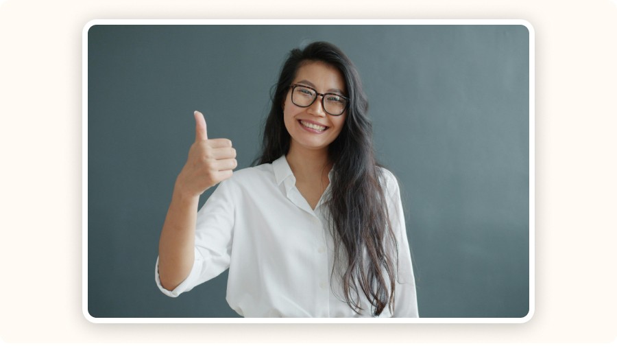 Woman with thumbs up