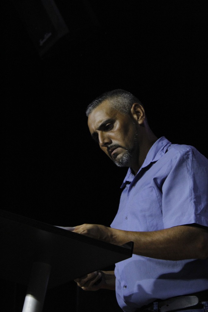 body of water under cloudy sky