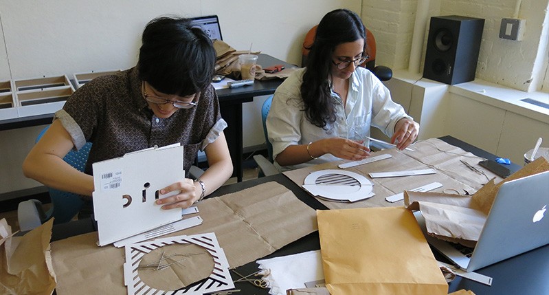 man and woman working at table