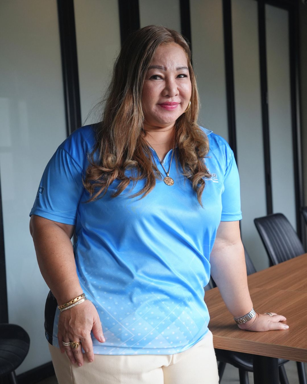 a picture of Sharon Portos, a real estate agent of the team