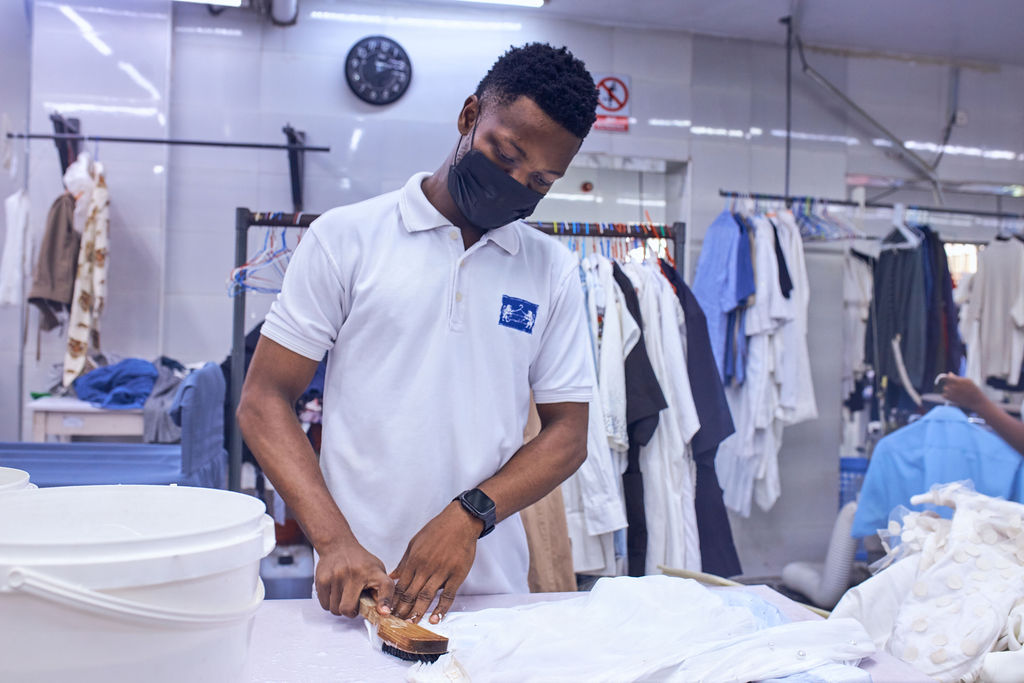 White patches on an orange wall.
