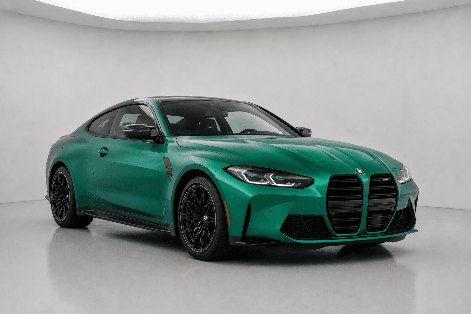 Green BMW M4 coupe with black accents