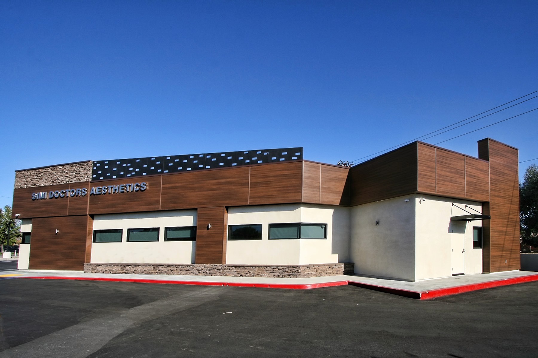 Exterior view of the clinic from the parking lot, showcasing the updated facade.