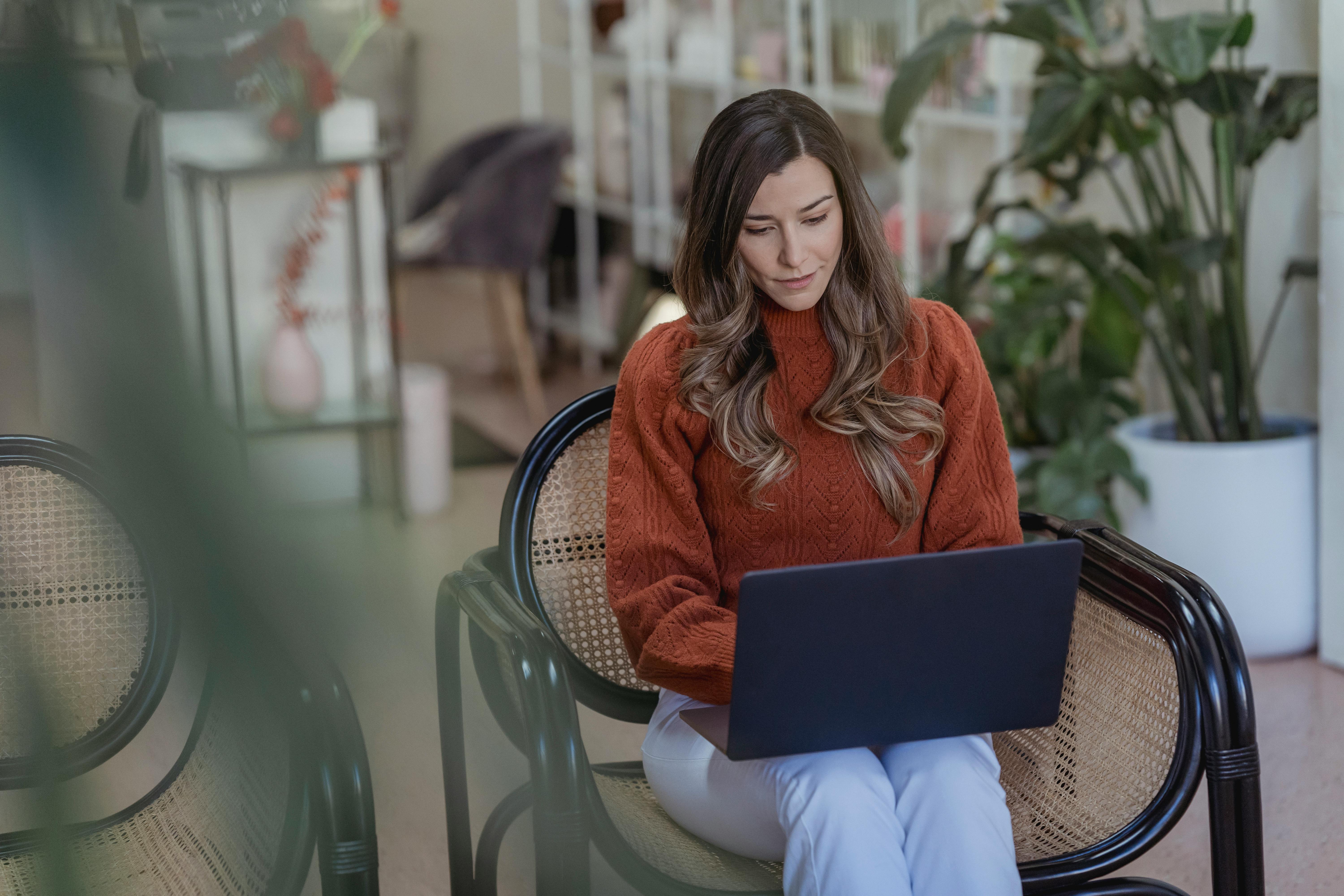 Female doing cold email marketing on laptop