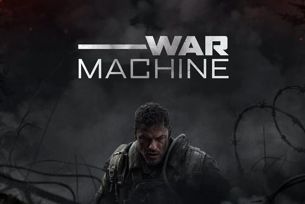 A soldier, clad in tactical gear with a determined expression, stands amidst a dark, war-torn landscape surrounded by barbed wire, under the bold title "War Machine" emblazoned in silver letters across a smoky backdrop.