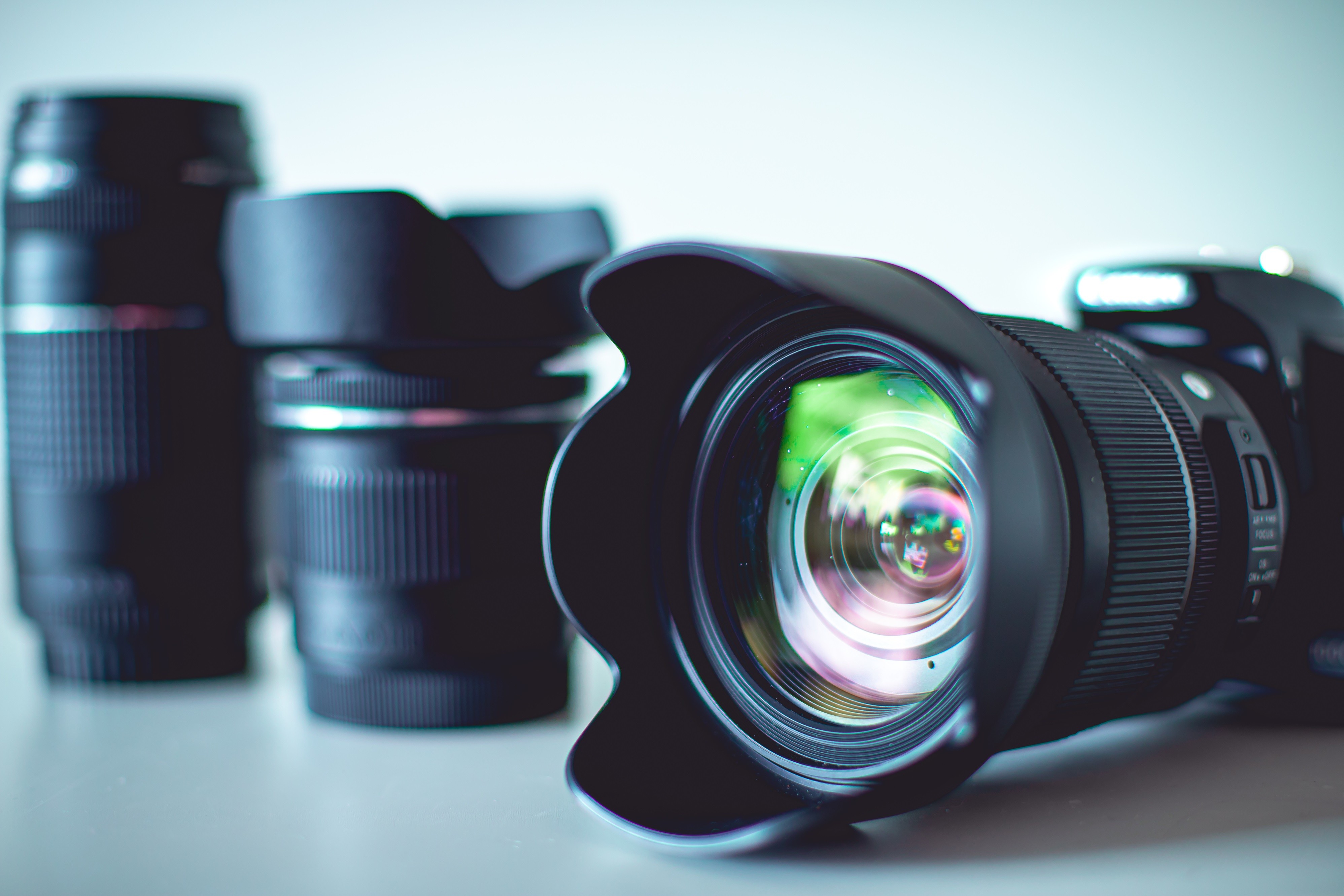 Close-up of professional camera gear representing commercial photography services.