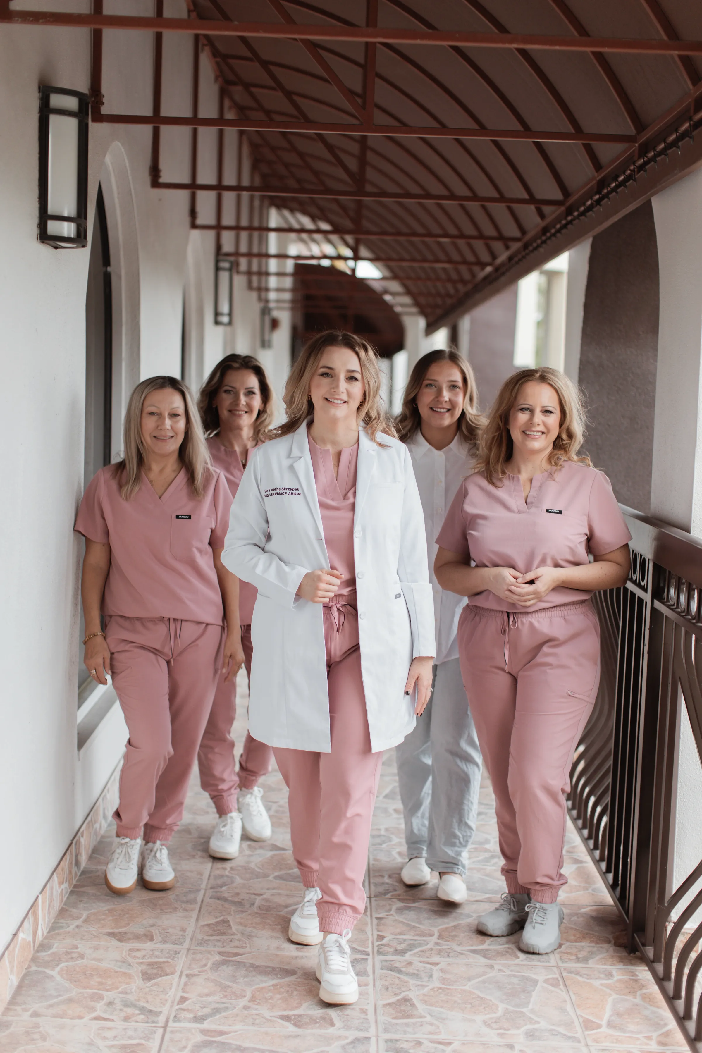 Dr. Karolina Skrzypek with the NaturaMed care team in Maitland, FL