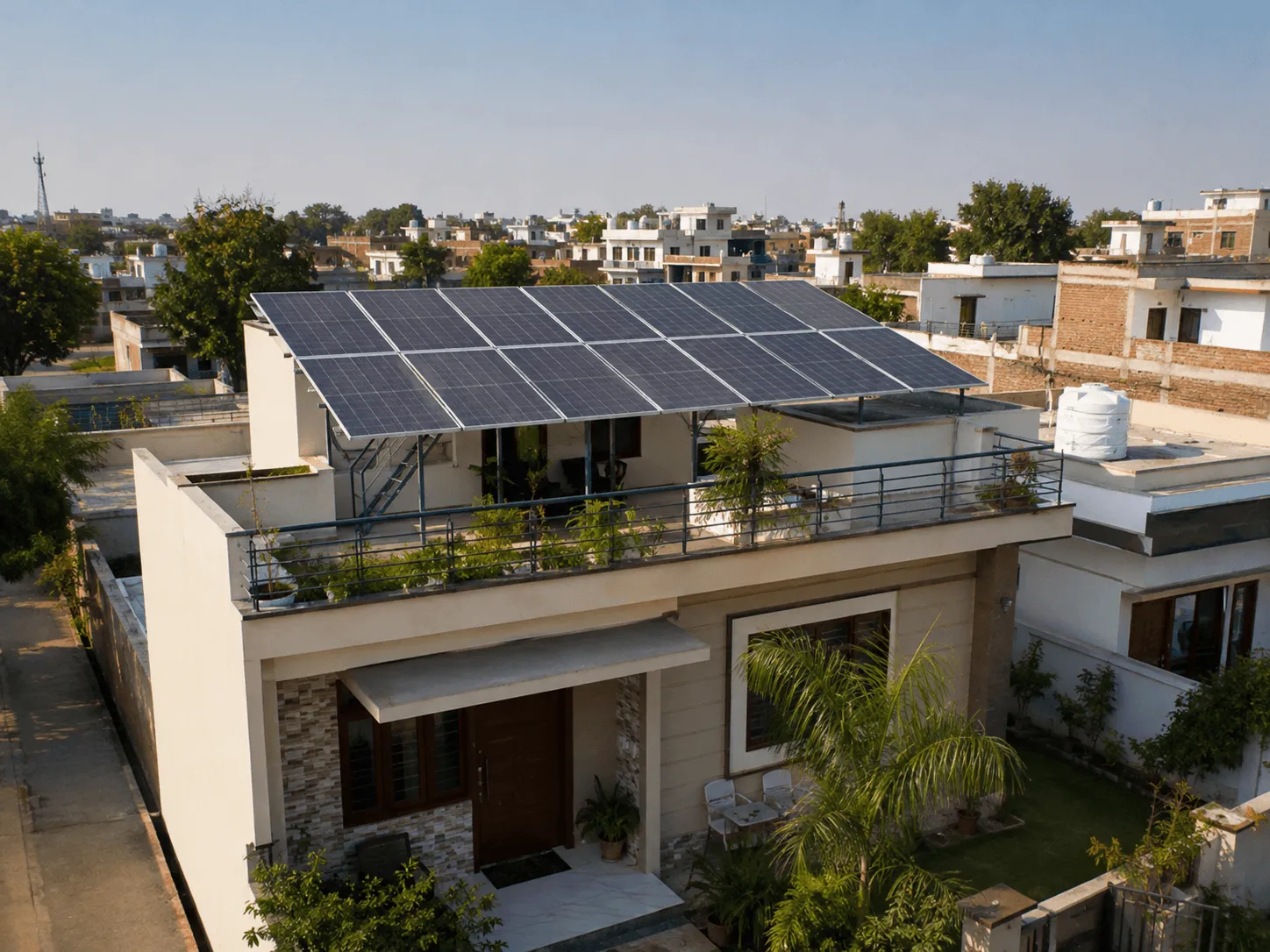 House with a rooftop solar panel structure and terrace plants overlooking the city