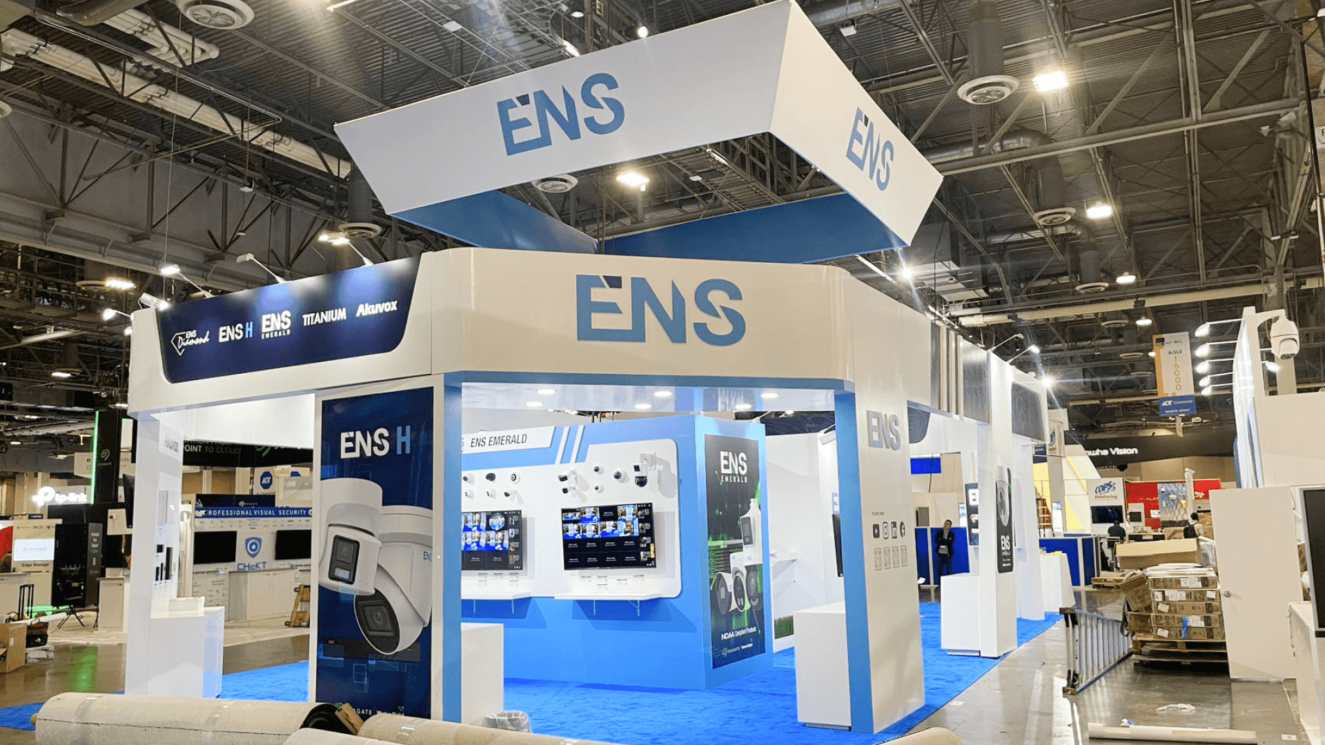 Overhead hanging ENS sign above 20x20 island booth at ISC West 2023 in Las Vegas.