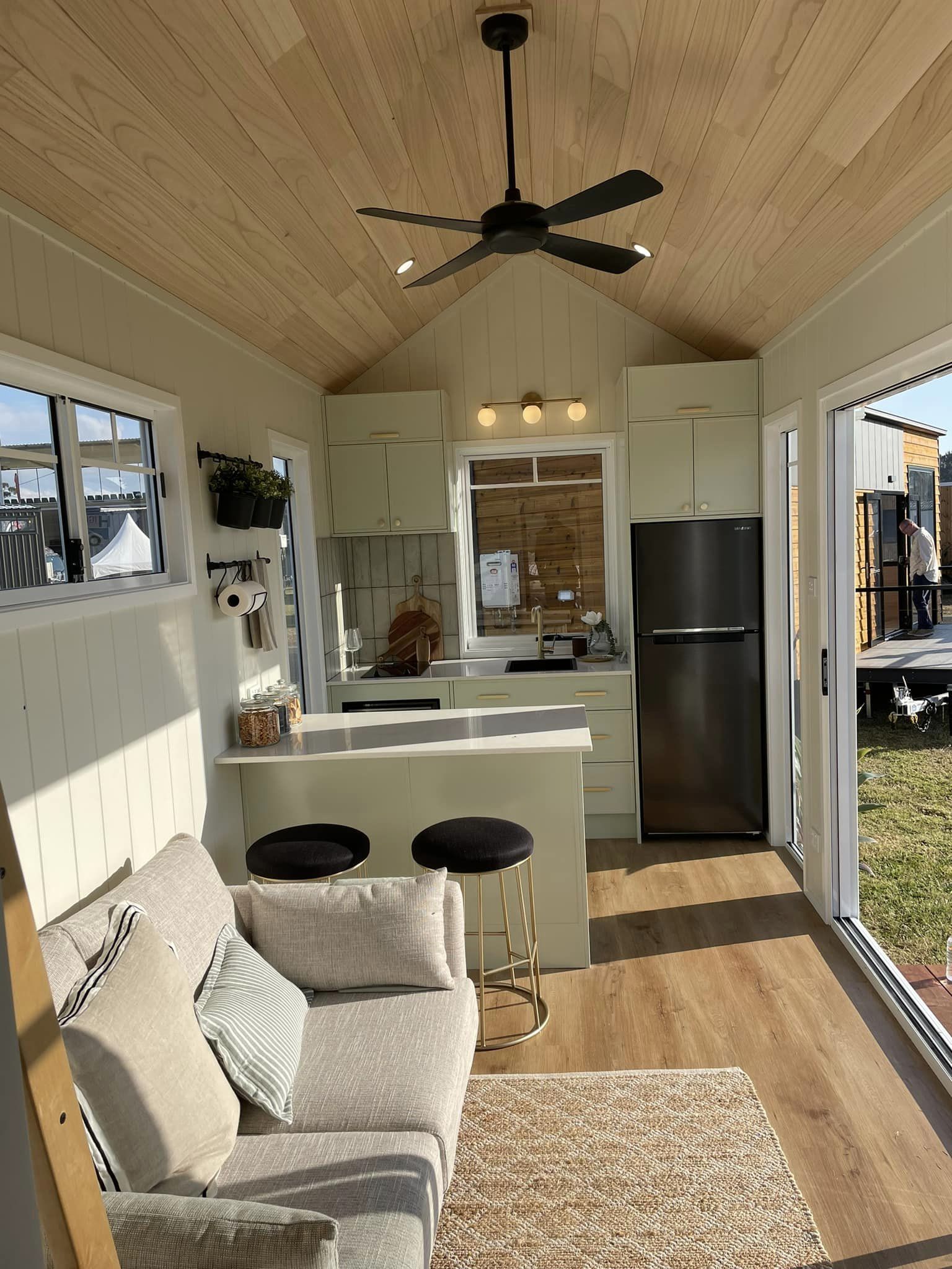 Tiny House Kitchen with dining in Highlands Tiny Homes Cali Design