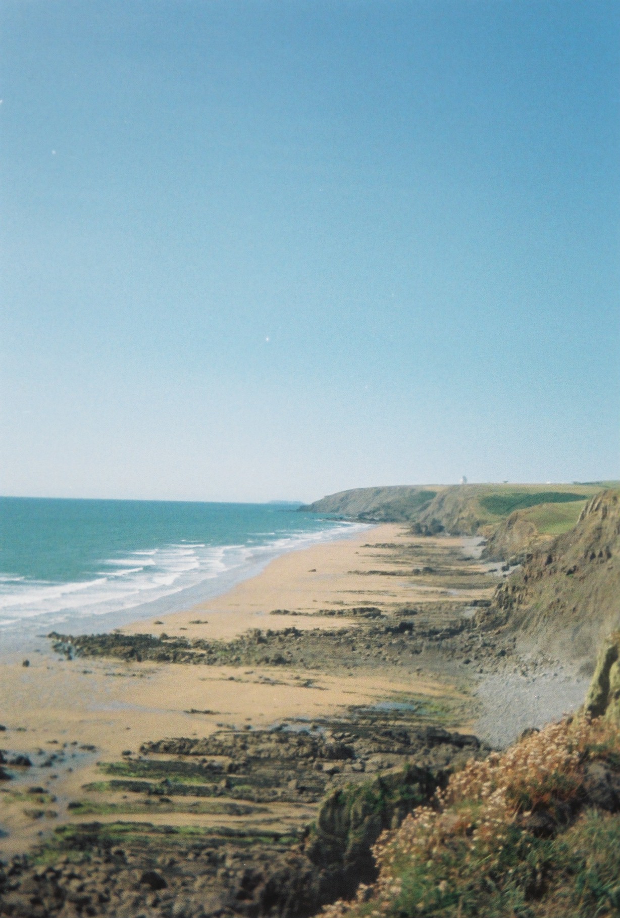 Rugged cliffs along a rocky coastline, England