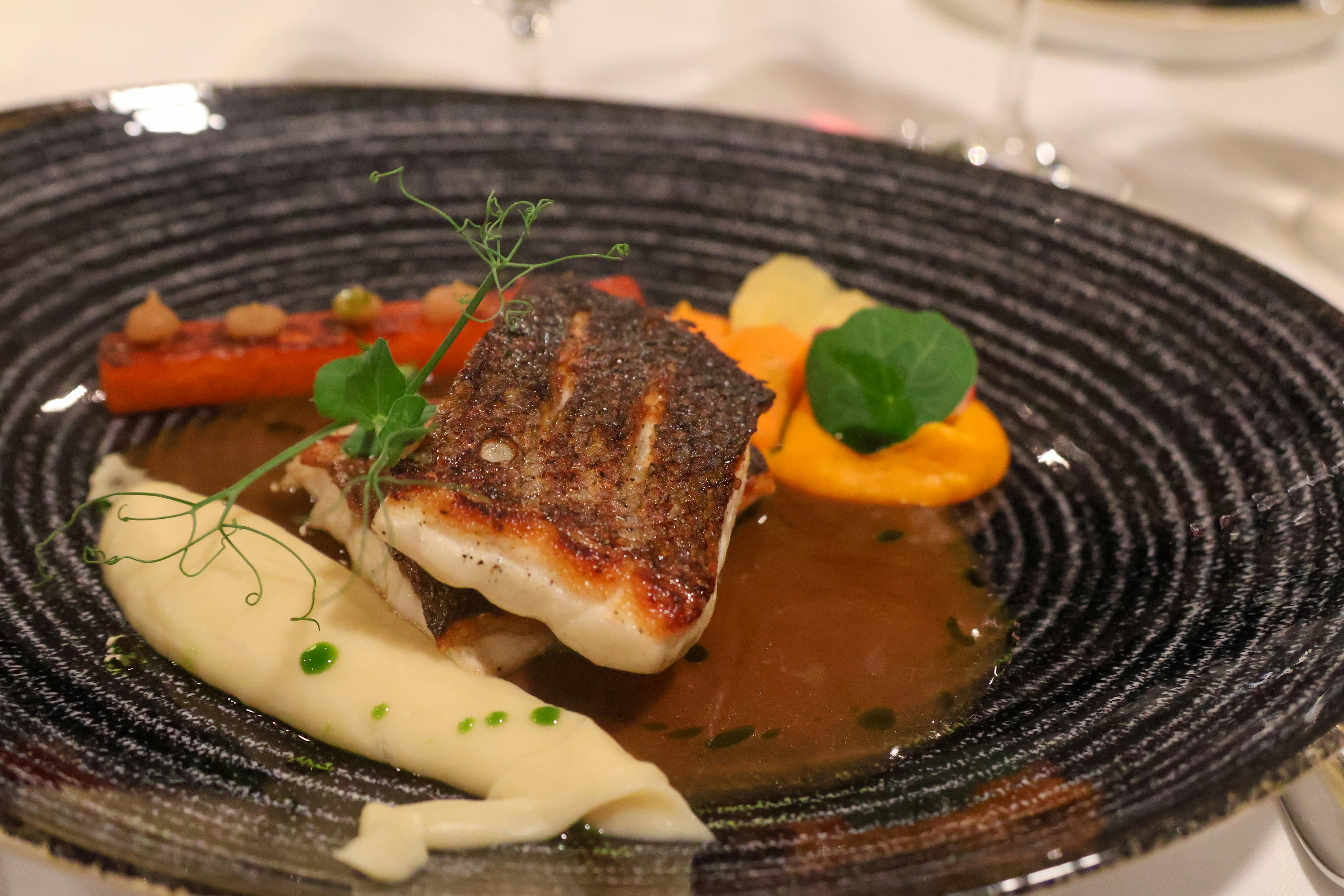 a plate of food on a table at a restaurant