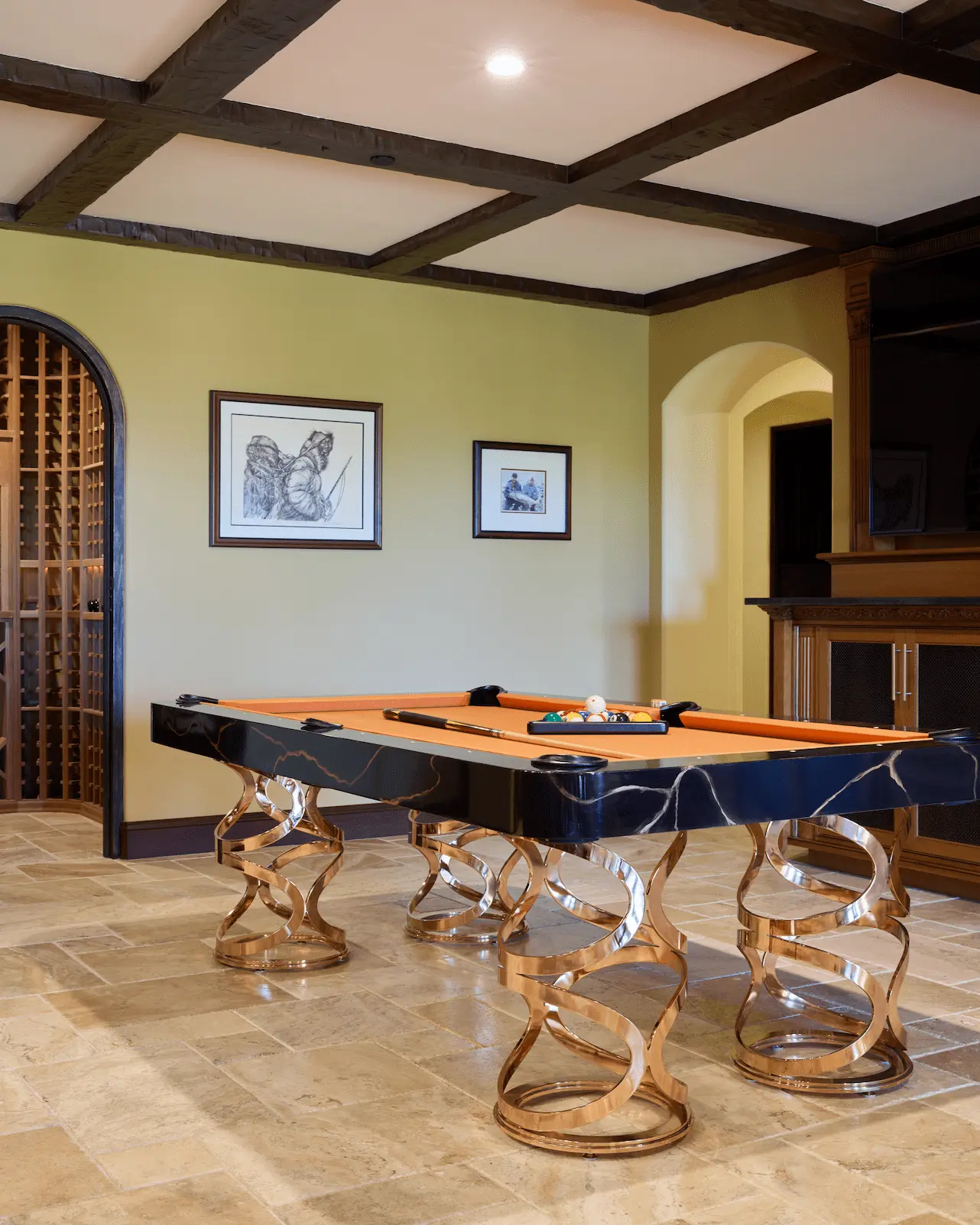 Portrait of the regal pool table, adding to the diverse entertainment options in the San Juan Capistrano remodel. Photo by Todd Huge.